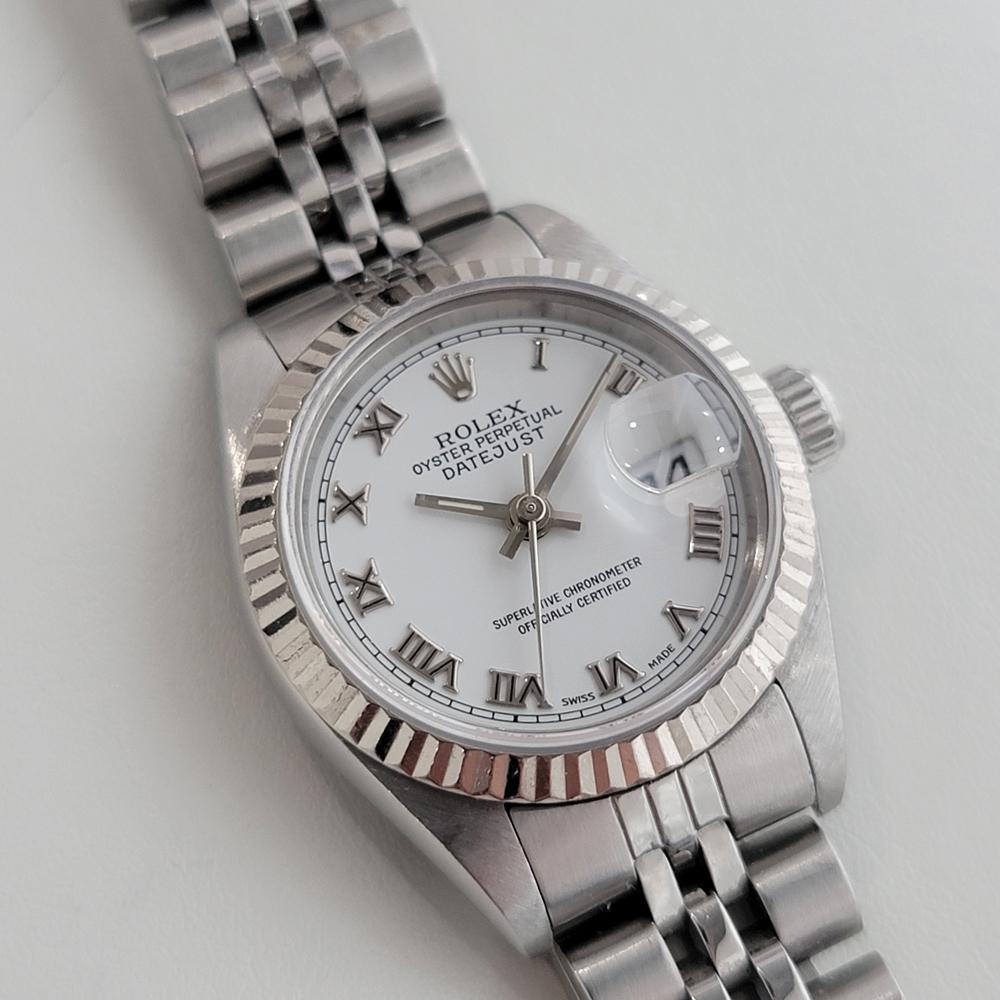 Charming luxury, Ladies 18k white gold & stainless steel Rolex Oyster Perpetual Datejust automatic, c.1996. Verified authentic by a master watchmaker. Gorgeous Rolex polar white dial with applied Roman numeral hour markers, silver minute and hour