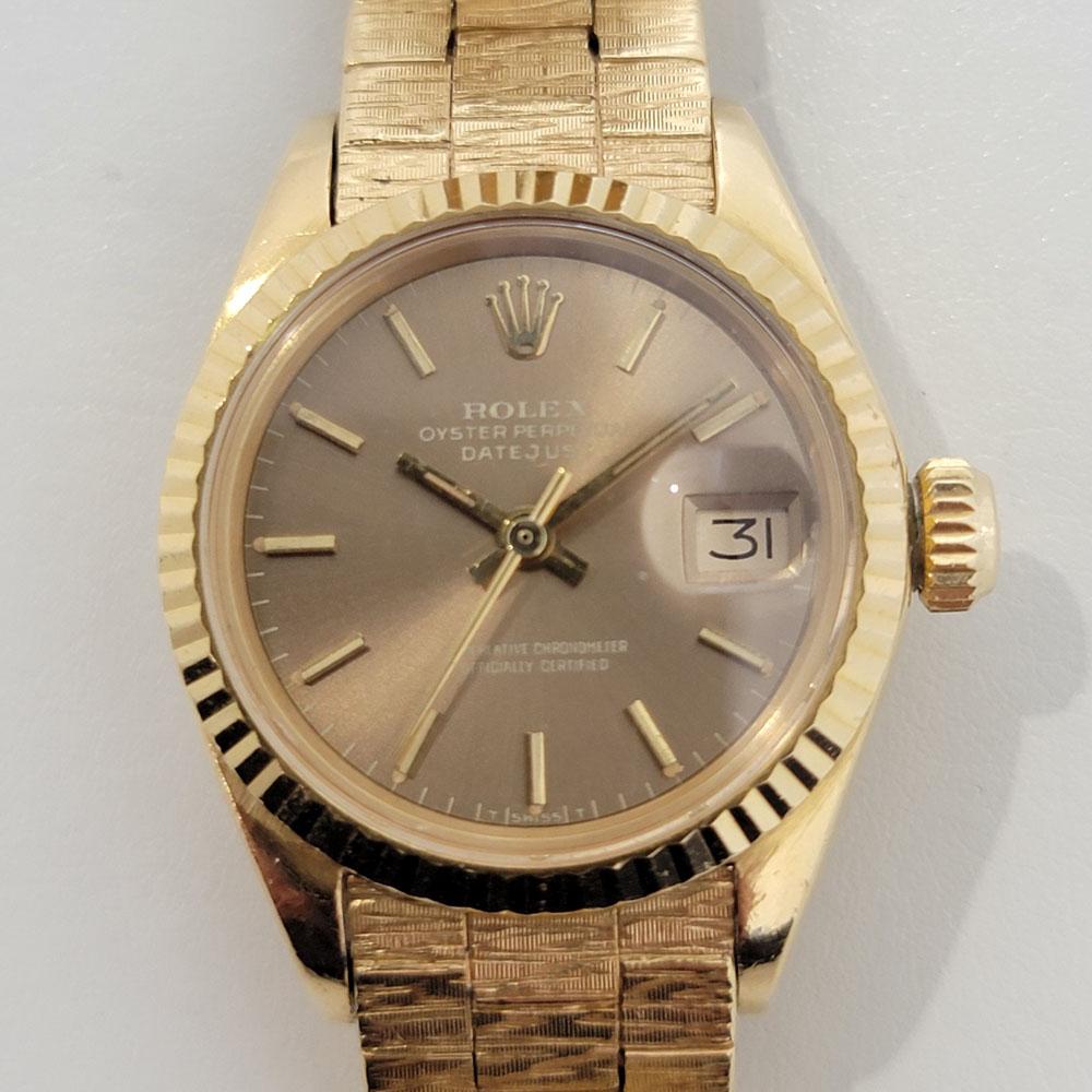 Timeless luxury, Ladies special edition 18k solid gold Rolex Oyster Perpetual Datejust automatic, c.1972, all original. Verified authentic by a master watchmaker. Gorgeous Rolex signed bronze dial, applied indice hour markers, gilt minute and hour