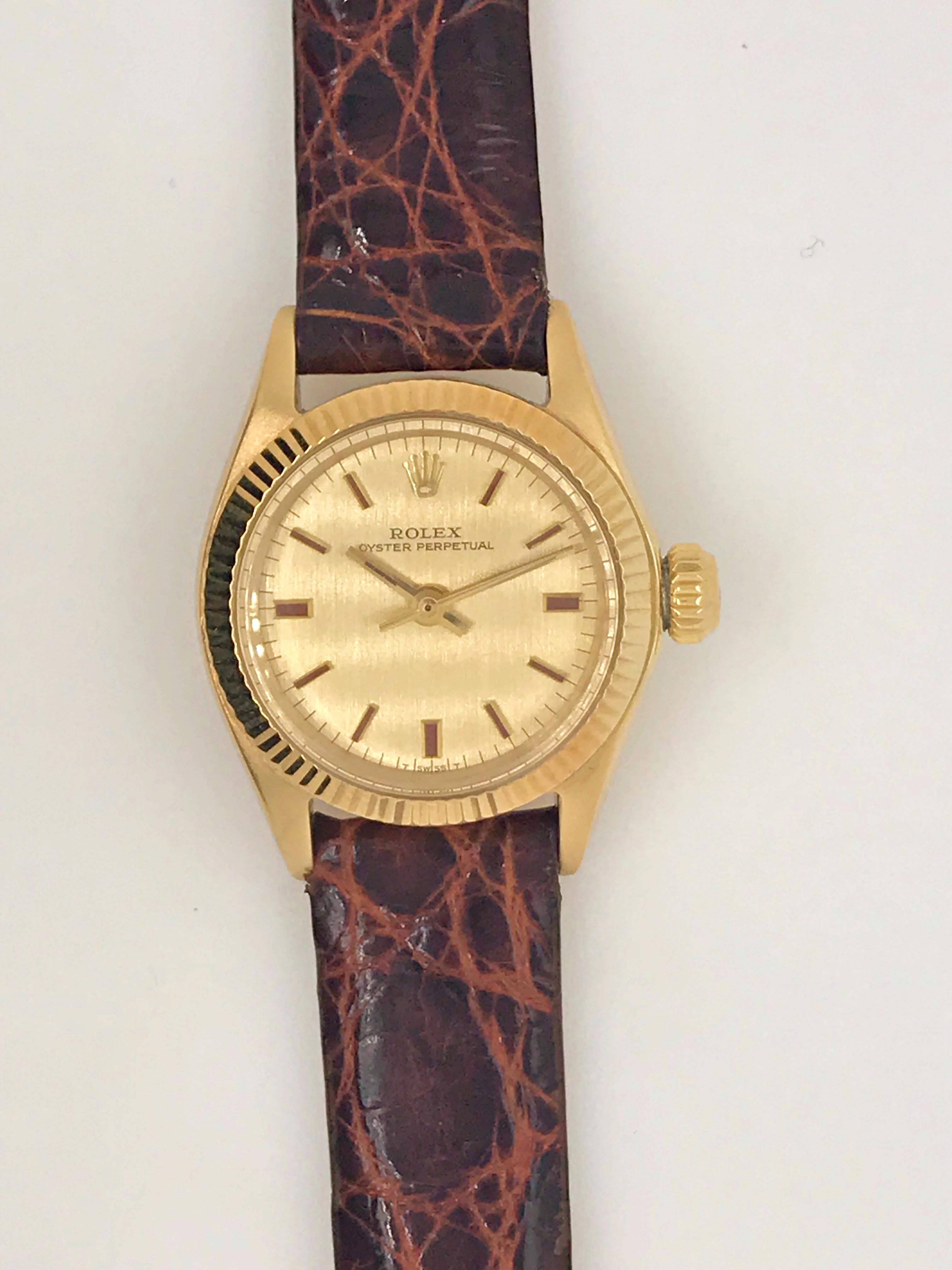 This Rolex is a feminine classic on a genuine alligator strap. Circa 1967. 

This timepiece was recently serviced and authenticated by a Rolex certified watchmaker. 
