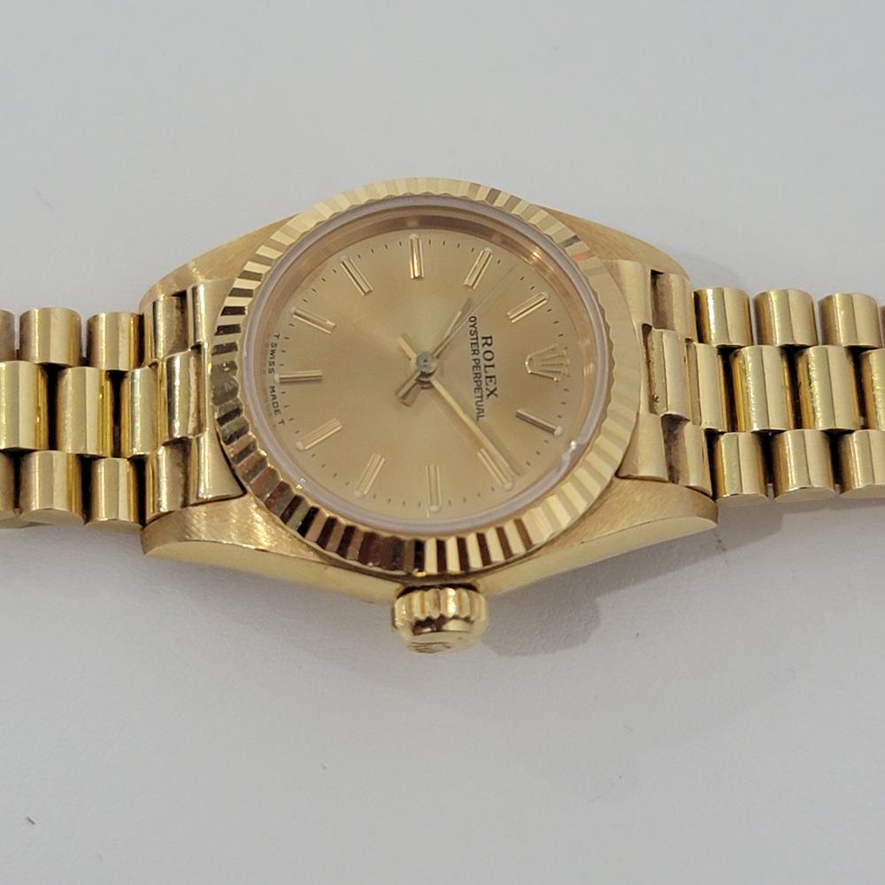 Ladies Rolex Oyster Perpetual 67198 18k Gold Automatic 1980s w Box RA260 In Excellent Condition In Beverly Hills, CA