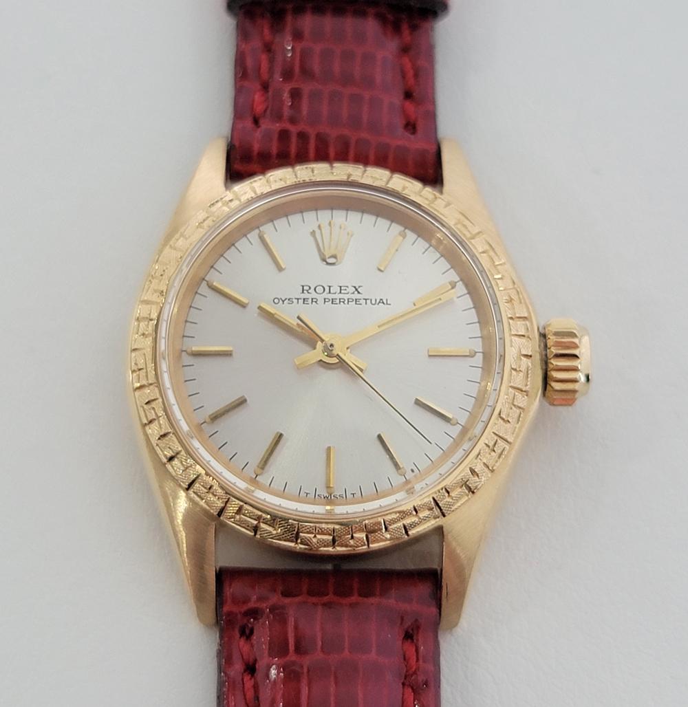 Luxurious elegance, Ladies 18k solid gold Rolex Oyster Perpetual automatic dress watch, c.1967, in pristine condition with rare etched bezel  by Rolex. Verified authentic by a master watchmaker. Gorgeous Rolex signed gilt dial, applied indice hour