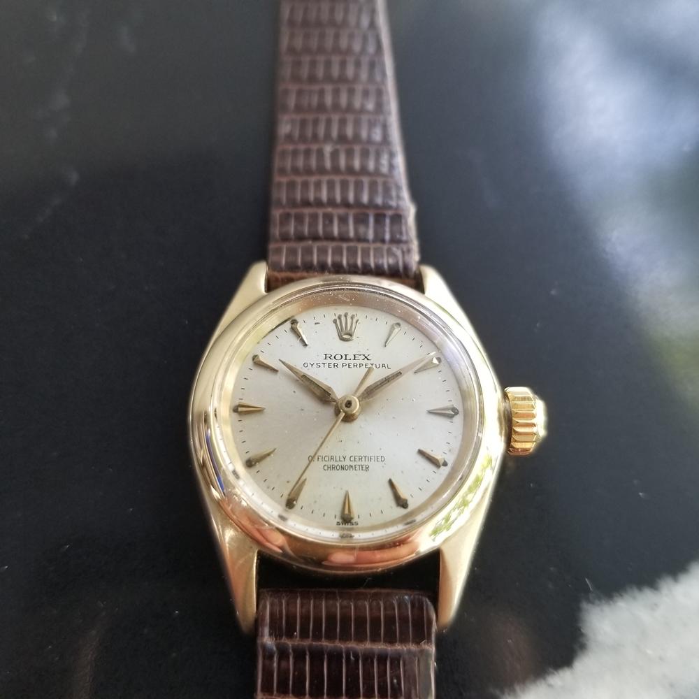 Timeless luxury, Ladies 14k solid gold Rolex Oyster Perpetual automatic dress watch, c.1963. Verified authentic by a master watchmaker. Gorgeous Rolex signed gilt dial, applied indice hour markers, gilt minute and hour hands, sweeping central second