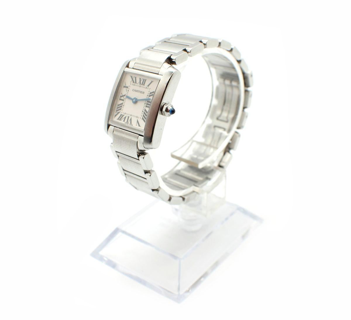 Movement: quartz
Function: hours, minutes
Case: 20mm stainless steel case, sapphire crystal
Band: stainless steel bracelet, steel clasp, fits up to a 6.25-inch wrist
Dial: cream dial, blue hands, black Roman numerals
Reference #: 2384
Serial #: