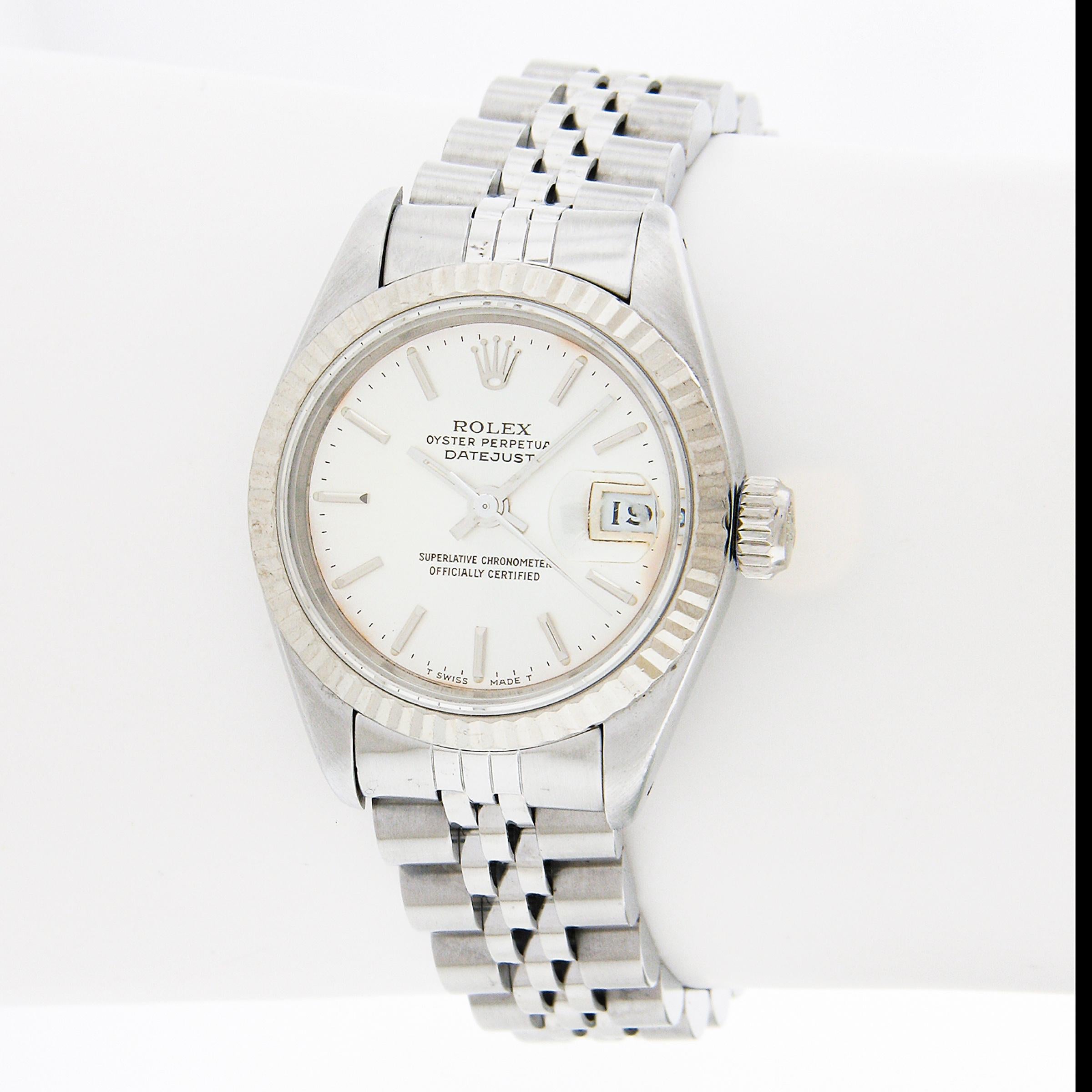 This Rolex Datejust is from 1987 and reference 69174. The automatic self-winding movement runs smoothly and keeps accurate time. The watch remains in excellent overall condition despite some light visible scratches that consist with normal use and