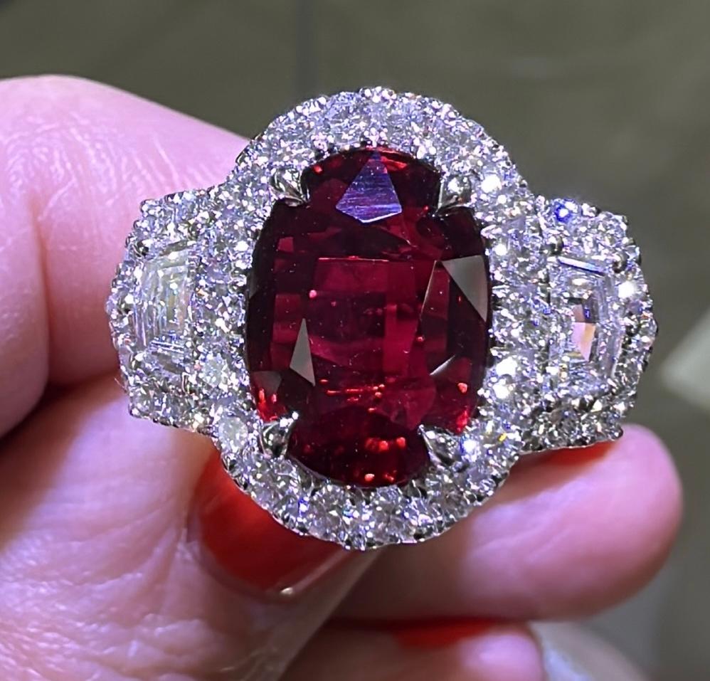 GRS Certified GRS2018-082830. Most desired pigeon blood red ruby statement cocktail ring is a great way to create an elegant, elevated look.
The center stone is 3.30carat oval in shape and has gorgeous facets. For extra sparkle, it has been framed