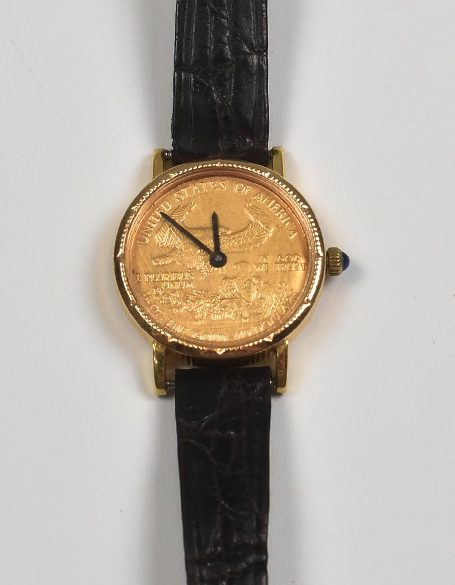 Ladies ten dollar standing liberty 22-karat yellow god watch. 1/4 ounce in weight. Quartz movement in running condition. Shark skin band. Small scratch on the back. Band has some light wear. Dimension: 1.07