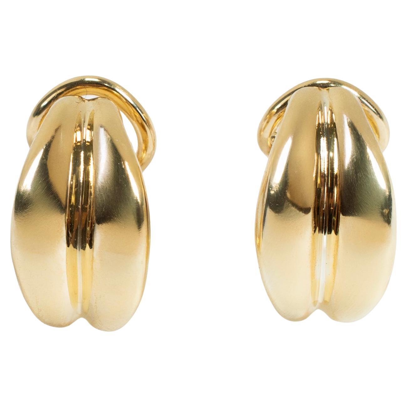 Ladies Tiffany 
Co. 18K Yellow Gold Small Omega Shrimp Huggies Clip on Earrings For Sale