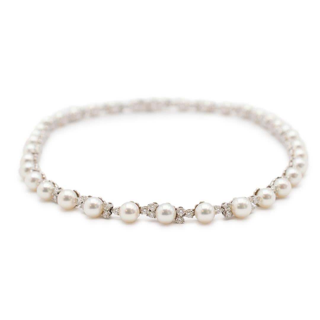 Lady's TIFFANY & CO designer made polished 950 platinum single strand choker, diamonds and Akoya cultured pearls fancy link necklace. The necklace measures approximately 16.00 inches in length by 6.70mm tapering to 2.40mm in width and weighs a total
