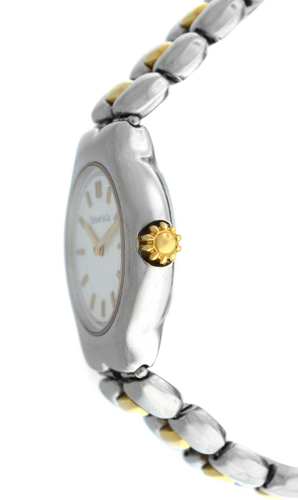 Brand	Tiffany & Co.
Model	Tesoro L0112
Gender	Ladies
Condition	Pre-owned
Movement	Swiss Quartz
Case Material	Stainless Steel & 18K Yellow Gold
Bracelet / Strap Material	
Stainless Steel & 18K Yellow Gold

Clasp / Buckle Material	
Stainless Steel