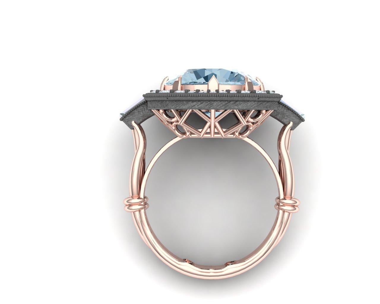 A stunning combination of steel blue and grey with the warmth of rose gold makes this ring one to stand out.  The center stone on this ring weighs apprx. 4 carats and has a stunning blue grey color.  The center stone is a pastel blue which contrasts