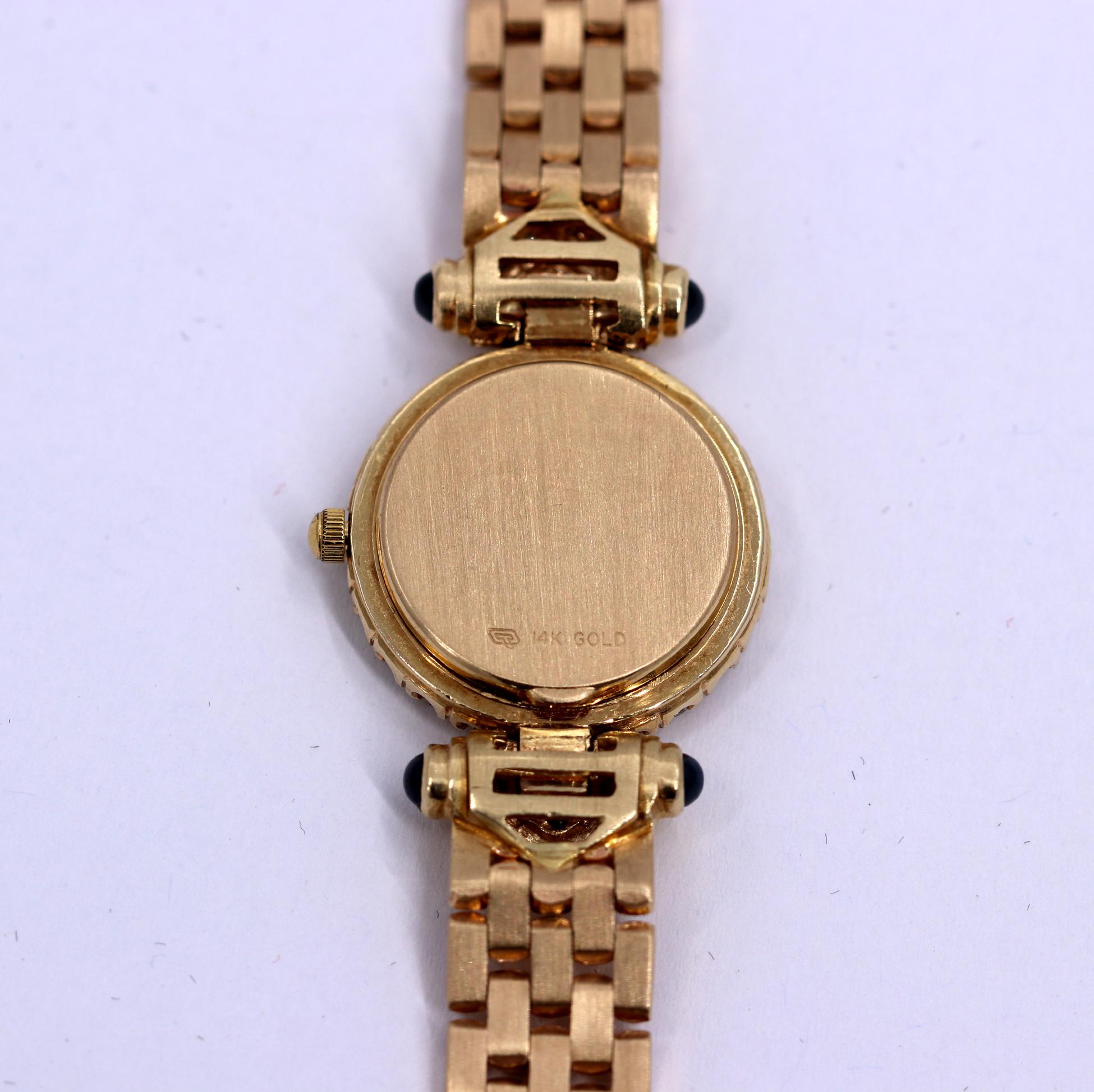 Ladies Tourneau Gold Watch with Diamonds Sapphires and Mother of Pearl Dial In Good Condition In Palm Beach, FL