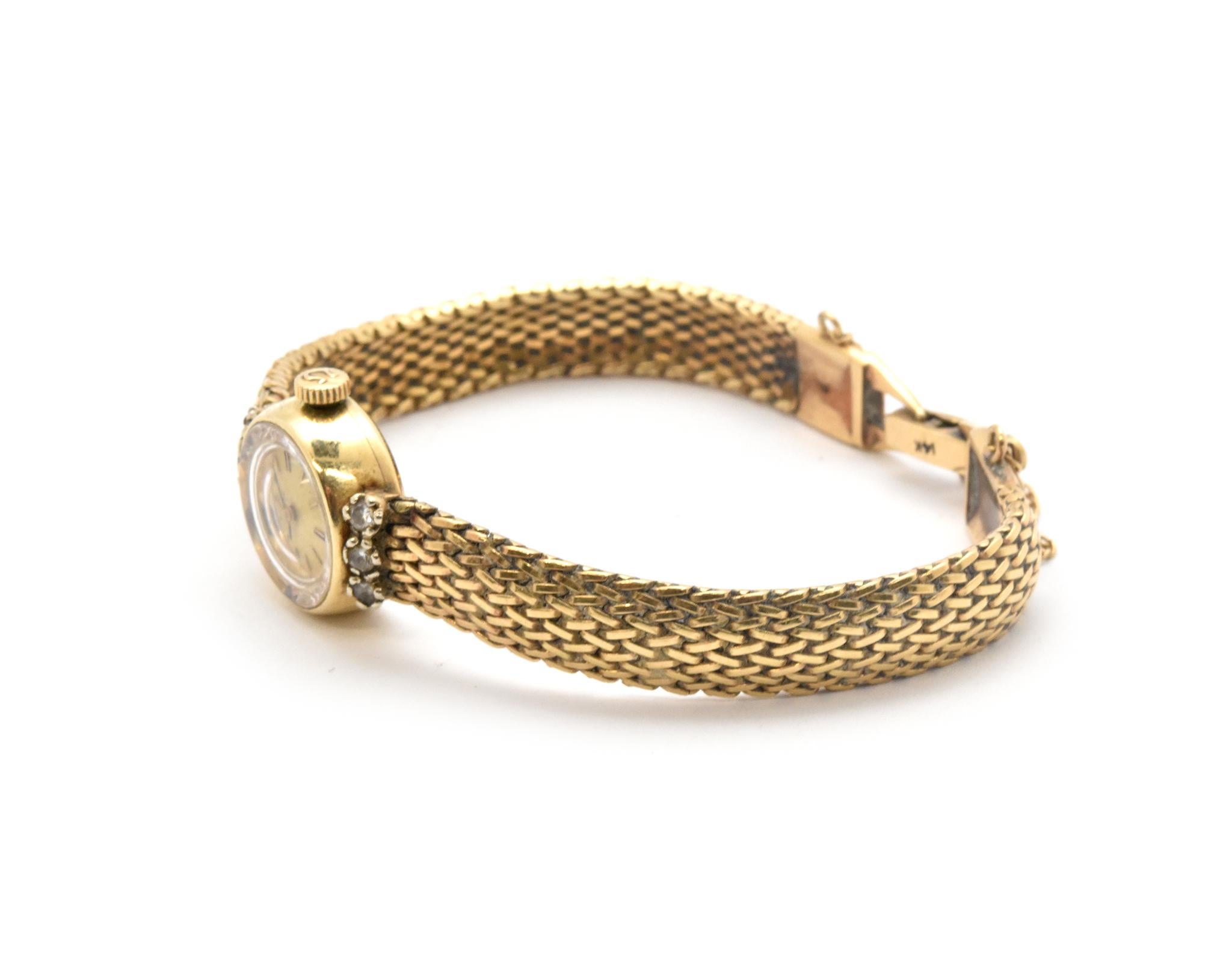 omega 14 karat gold watch