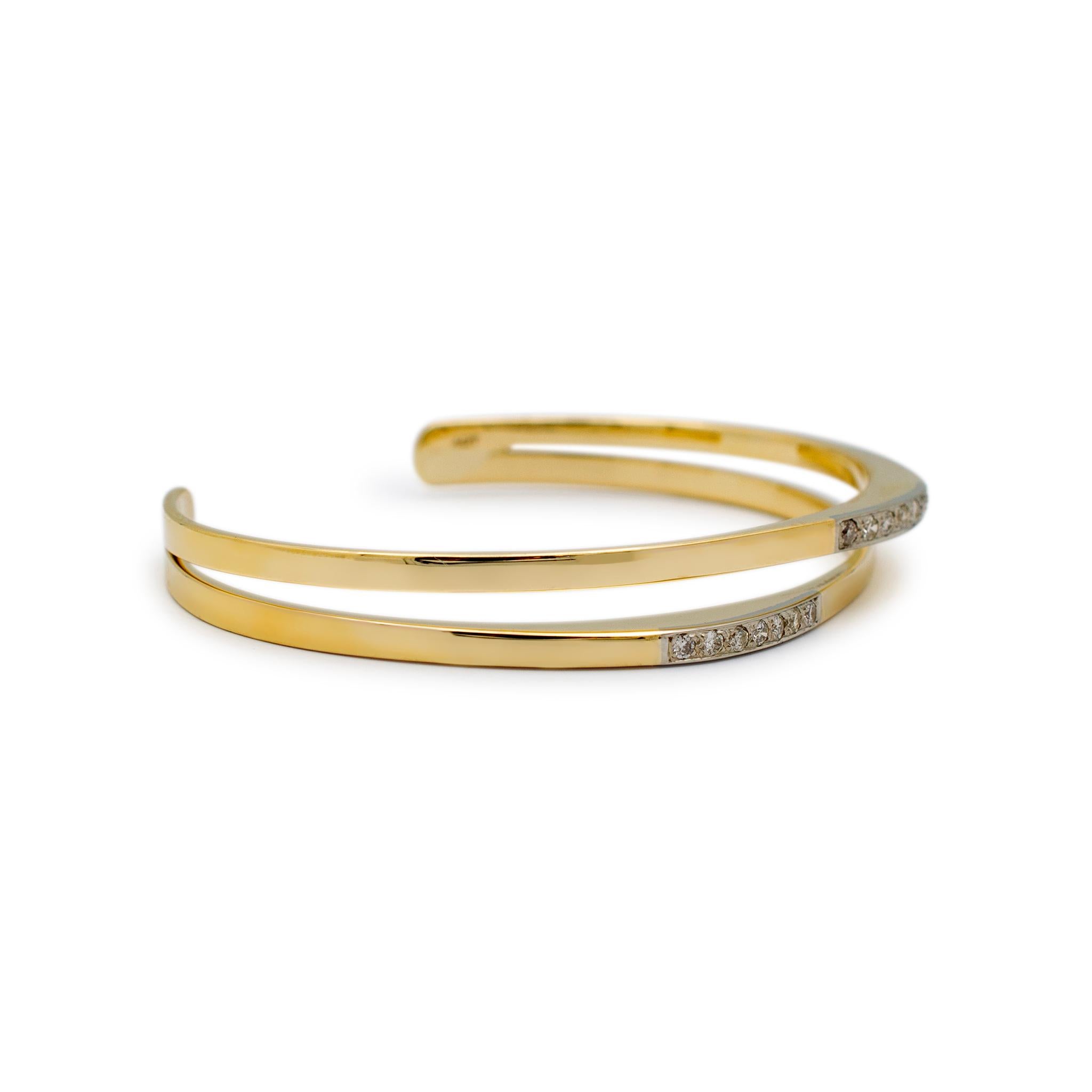 Gender: Ladies

Metal Type: 14K Yellow Gold

Length: 6.25 inches

Width: 7.35 mm

Weight: 17.00 grams

Ladies custom-made polished 14K yellow gold, diamond vintage cuff, bangle bracelet. Engraved with 
