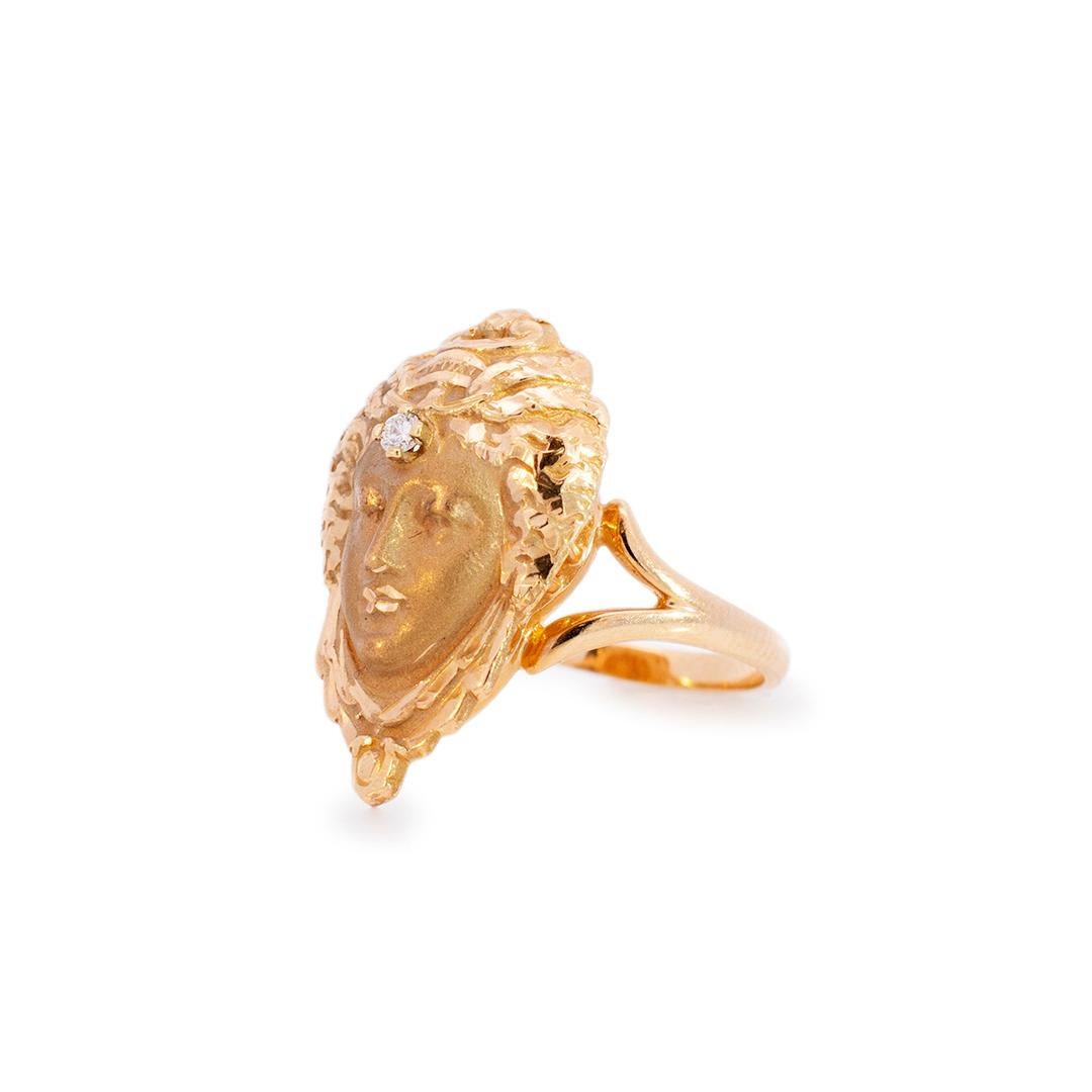 Ladies handmade satin finished, polished 14K yellow gold, diamond vintage, cocktail ring with a half round shank.
The ring is a size 6.
Shank is 2.15mm thick and Head measures approximately 24.60mm tapering to 15.70mm in width.
Ring weighs a total
