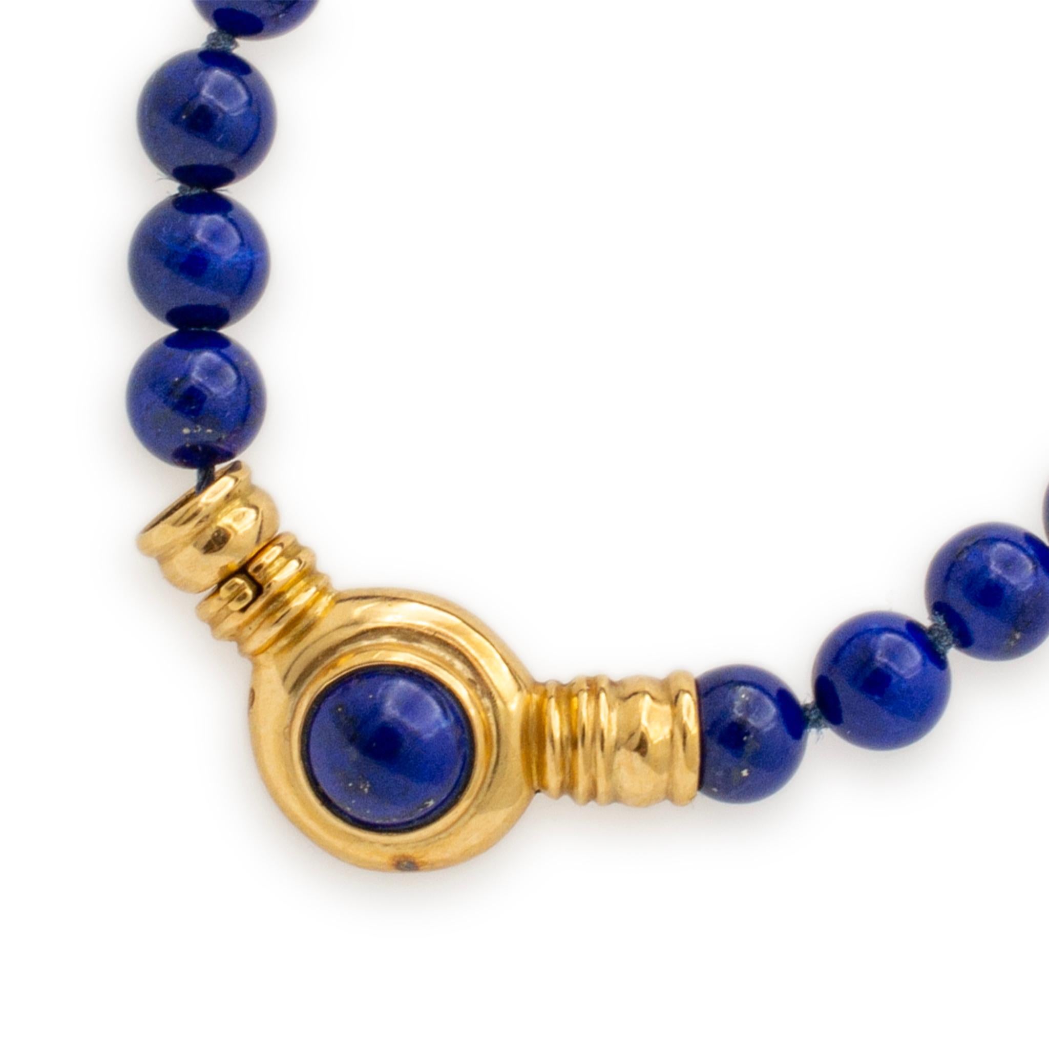 Gender: Ladies

Metal Type: 18K Yellow Gold

Length: 17.00 inches

Weight: 27.40 grams

Ladies 18K yellow gold collar lapis lazuli bead necklace. Engraved with 