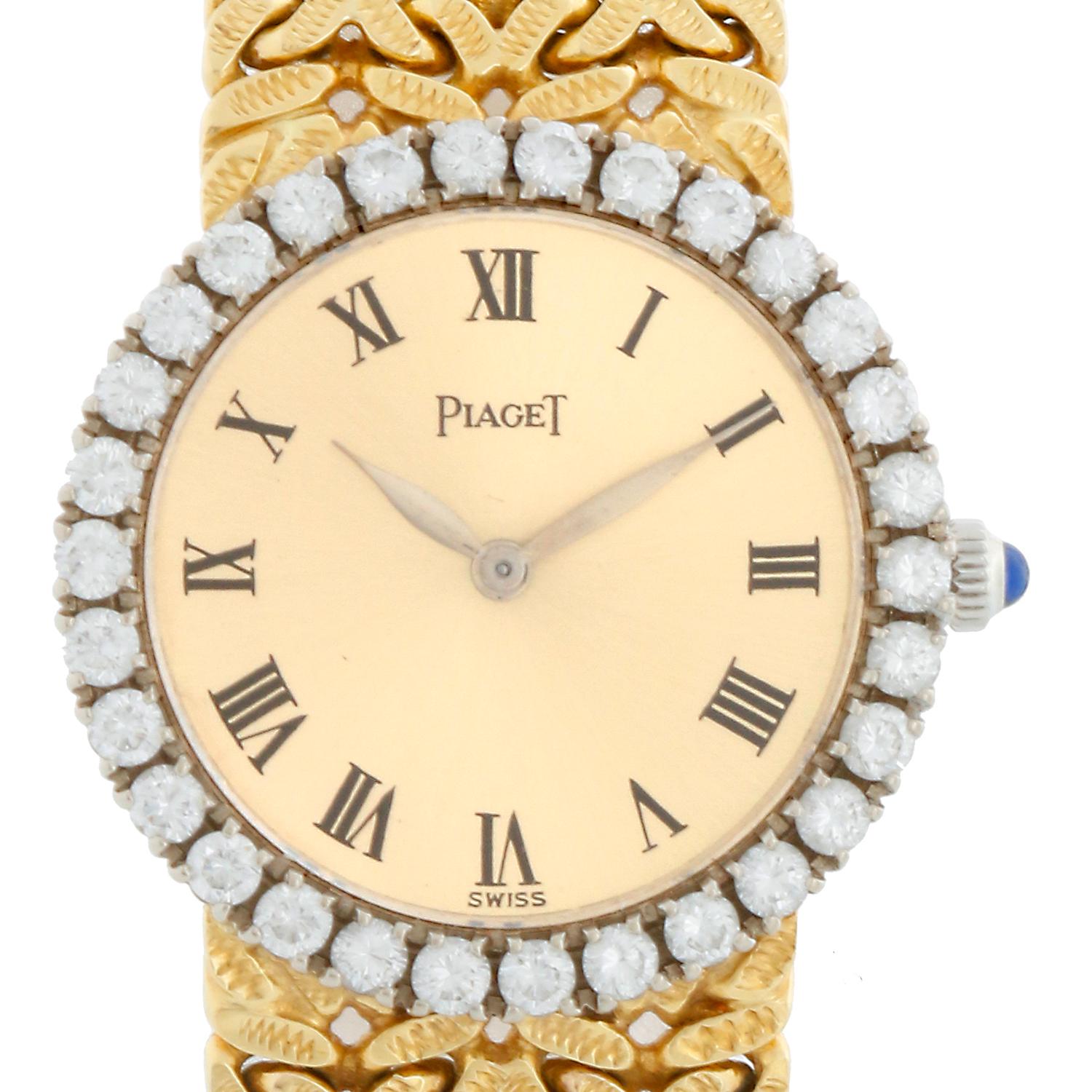 Ladies Vintage 18k Gelbgold Piaget mit Diamanten 9190 - Handaufzug. Gehäuse aus 18 Karat Gelbgold (25 mm) mit Diamantlünette. Champagnerfarbenes Zifferblatt mit römischen Ziffern. 18k Gold Mesh Piaget Armband; wird bis zu einem 6 1/4 Zoll Handgelenk