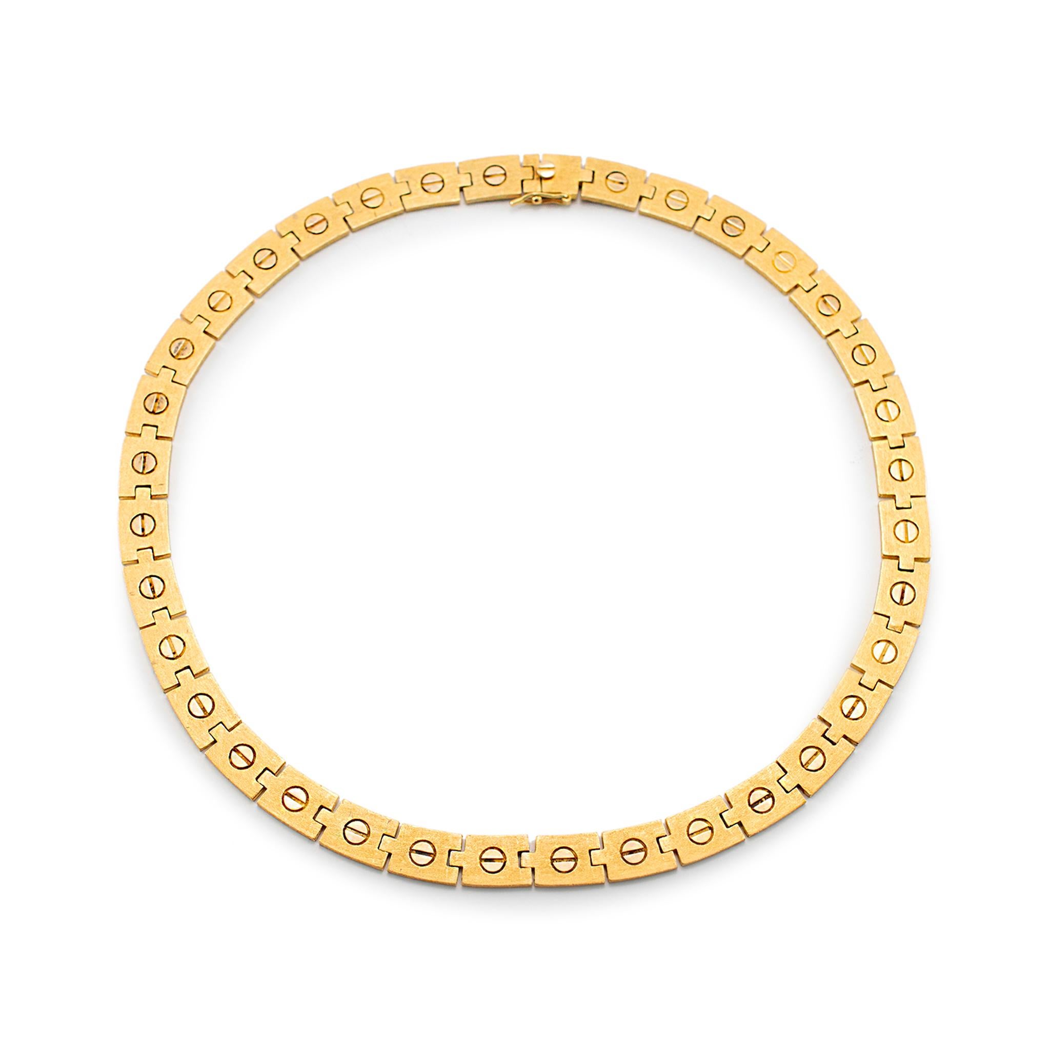Gender: Ladies

Metal Type: 18K Yellow Gold 

Length:  16.00 inches 

Width: 8.45 mm

Weight: 35.50 Grams

One ladies handmade matte finished, brush finished 18K yellow gold choker, vintage necklace. The metal was tested and determined to be 18K