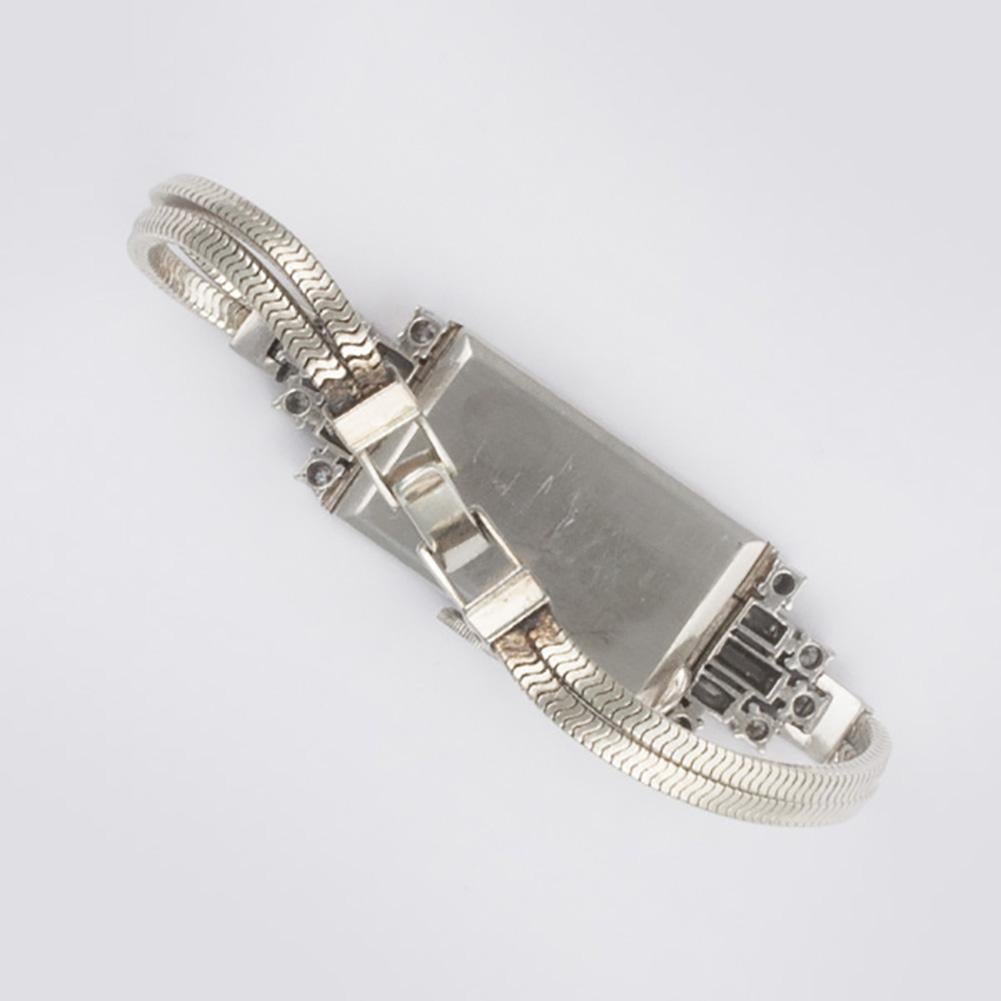 Damen Vintage Art Deco Cocktail-Uhr in einem verzierten 18k Weißgold & Diamant-Gehäuse mit einer Doppel-Schlange 14k Weißgold Band. Handbuch. Hochwertiges Schweizer Uhrwerk von Knapp. Fine Pre-owned Vintage Uhr.   Certified preowned Vintage Vintage