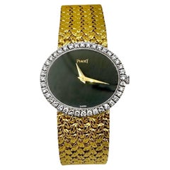Ladies Vintage Piaget Ultra-Thin Gold Diamond and Onyx Wrist Watch