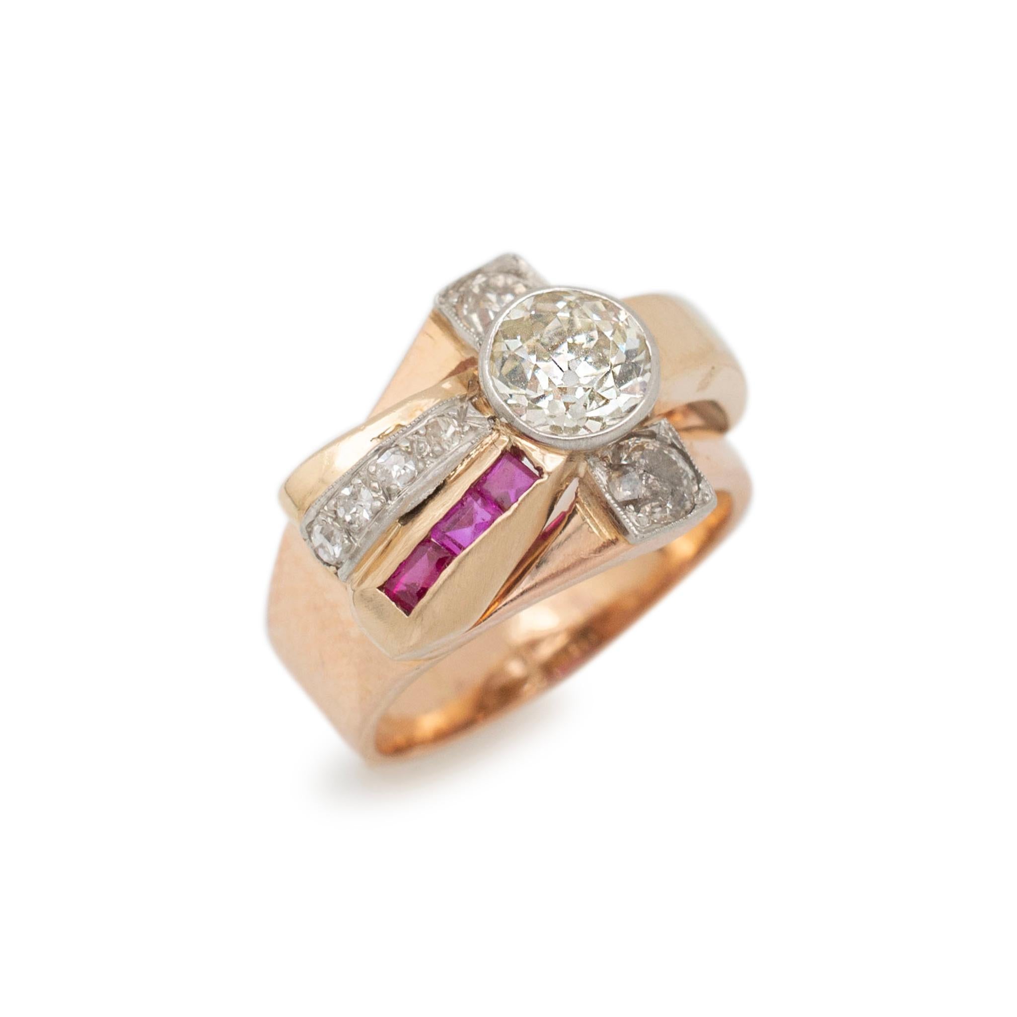 Gender: Ladies

Metal Type: Platinum & 14K Yellow Gold

Size: 4

Shank Maximum Width: 11.50 mm tapering to 4.35 mm

Weight: 4.80 grams

Ladies 14K yellow gold and platinum diamond and ruby vintage cocktail ring with a half round shank. The metals