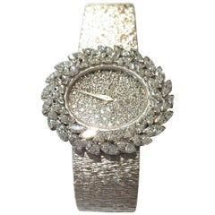 Ladies White Gold Piaget Watch with Diamond Dial and Diamond Laurel Leaf Bezel