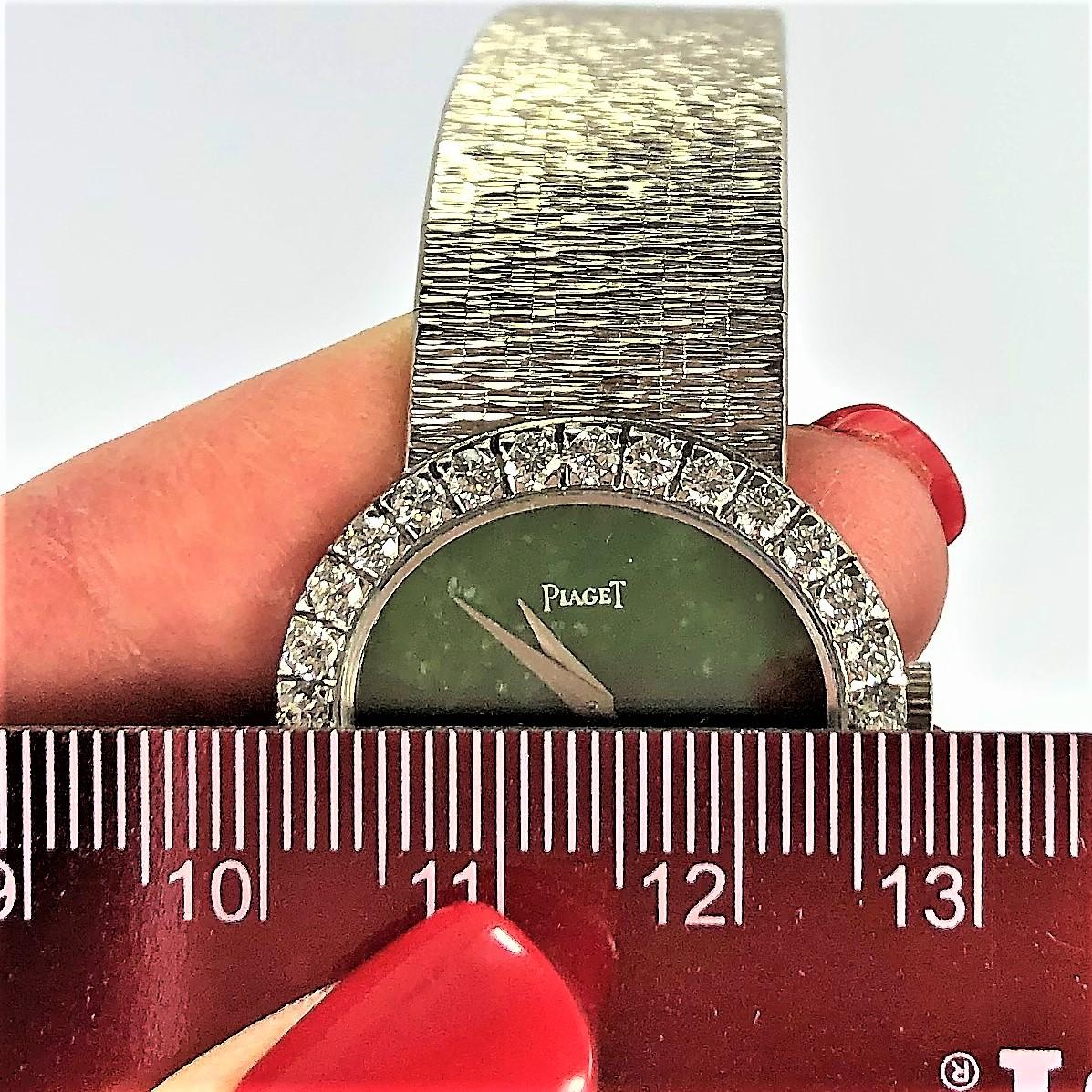 Round Cut Ladies White Gold Piaget Watch with Oval Shaped Jade Dial and Diamond Bezel