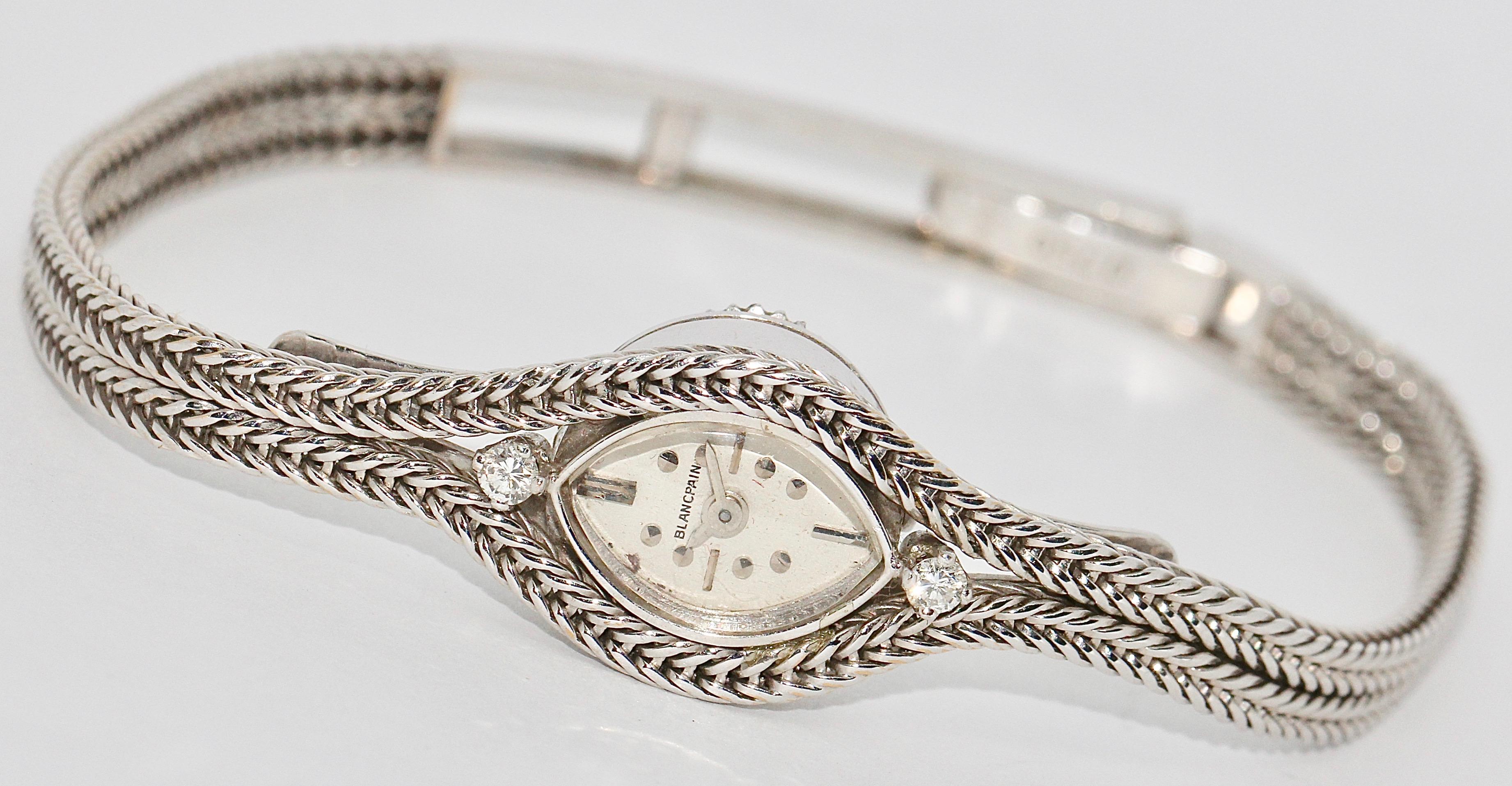 Elegant, dainty Ladies Wristwatch by Blancpain, 18 Karat white Gold with Diamonds, manual wind.

The watch comes with a certificate of authenticity.