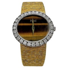 Retro Ladies Yellow Gold Piaget Oval Shaped Tiger's Eye Dial with Diamond Bezel