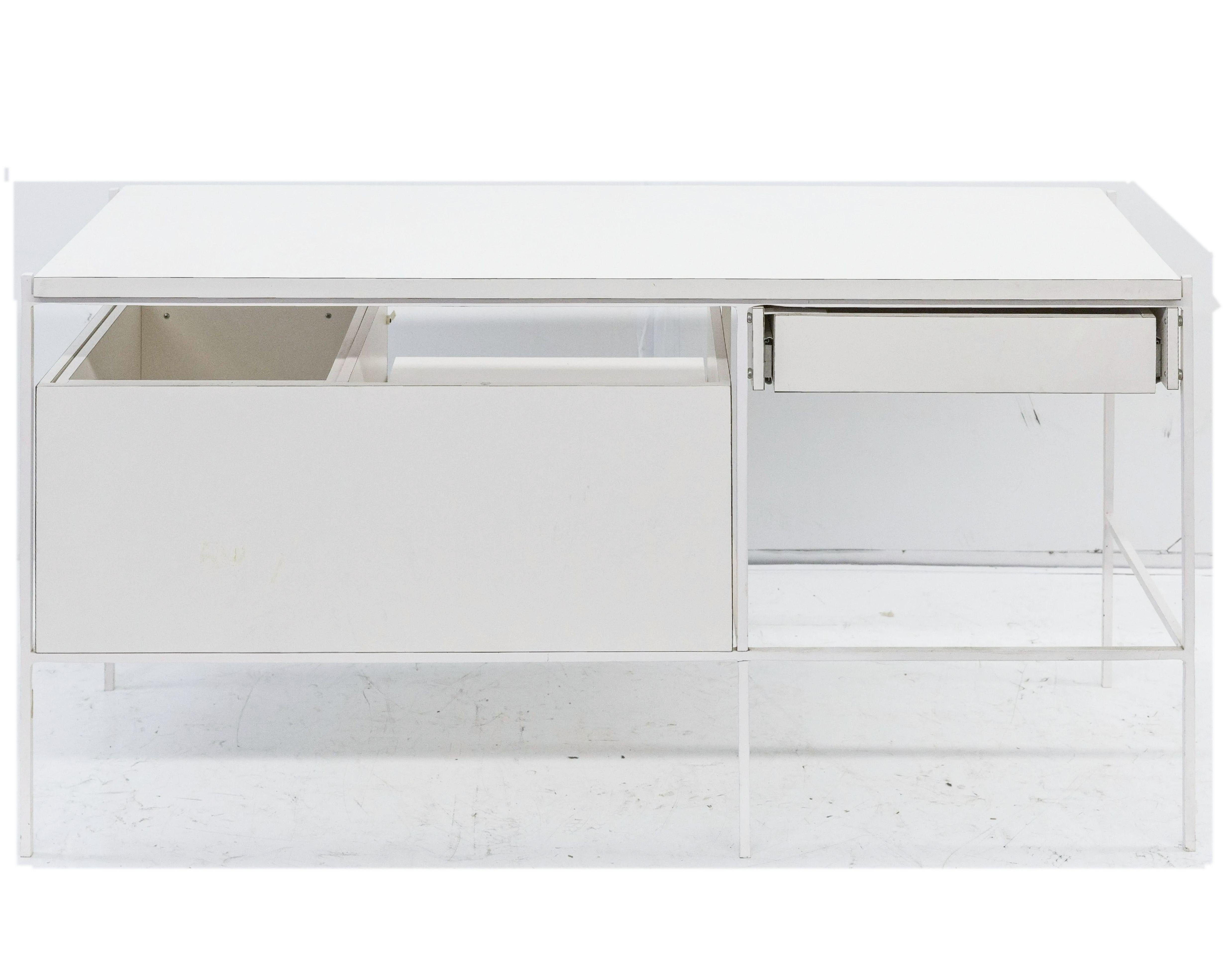 Ladislav Rado white enameled steel modern desk, Vanity, 1955, Knoll and Drake.

Knoll and Drake produced a signature modern line of furniture for a few short years which had enameled square painted tube for its structural elements and was designed
