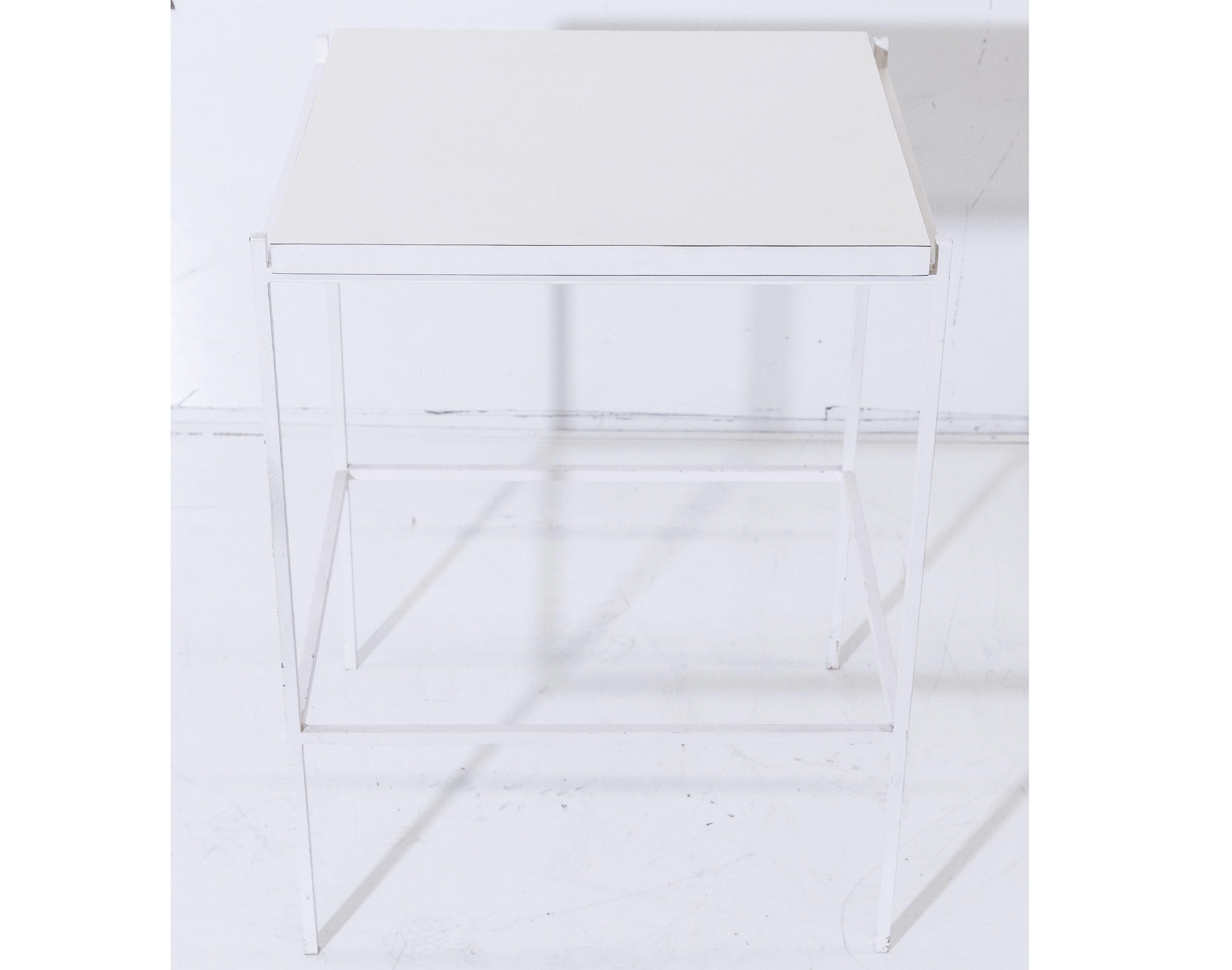 Ladislav Rado white enameled steel modern side table, 1955, Knoll and Drake.
Knoll and Drake produced a signature modern line of furniture for a few short years which had enameled square painted tube for its structural elements and was designed by