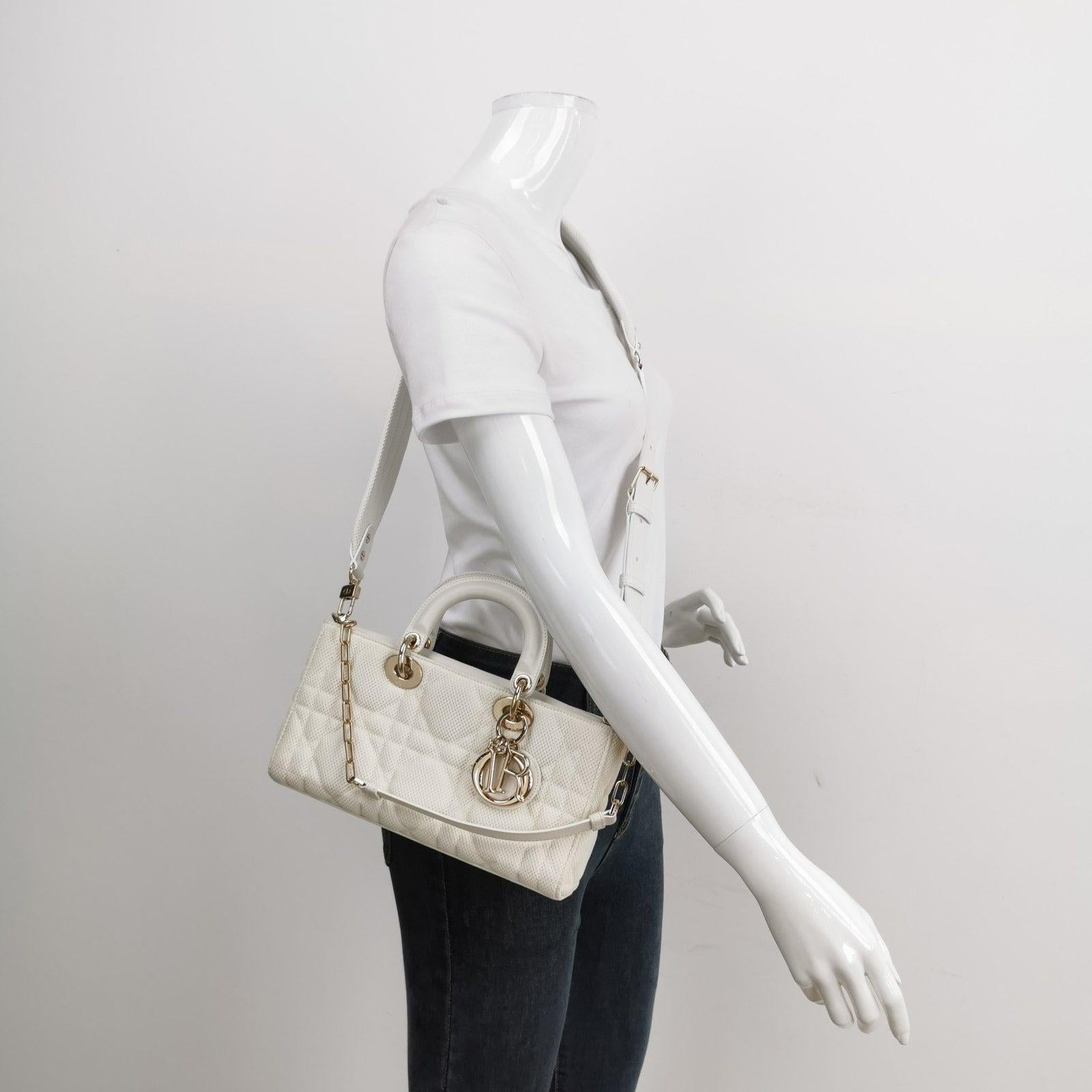 Lady D-Joy Mini Handbag Microcannage Technical Fabric White with Two Straps
  These are professional photos of the actual bag.
  The newest addition to Dior's handbag collection is the Lady D-Joy collection, offering a unique twist on the timeless