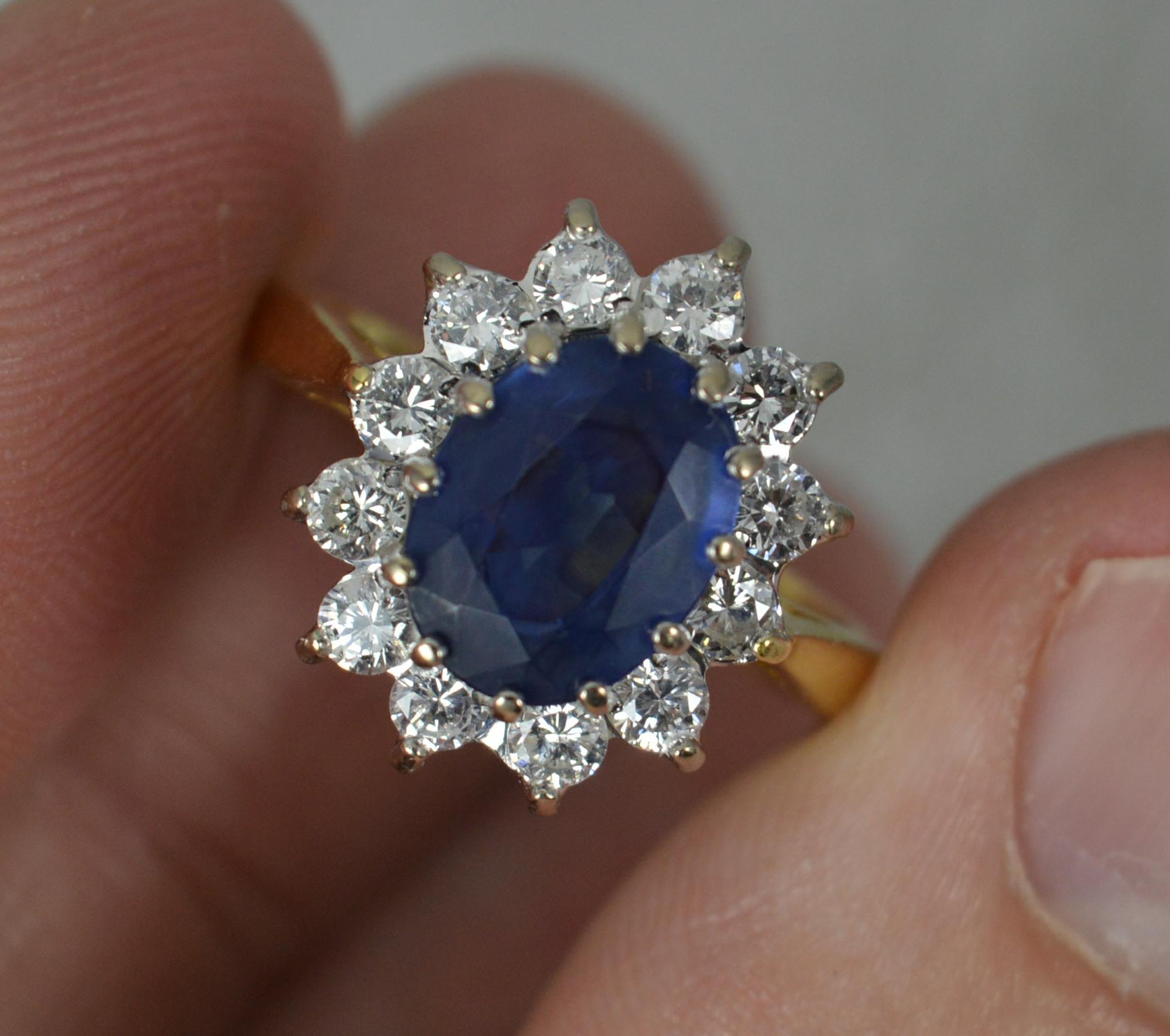 Contemporary Lady Diana Blue Sapphire and 0.7ct Diamond 18ct Gold Cluster Ring