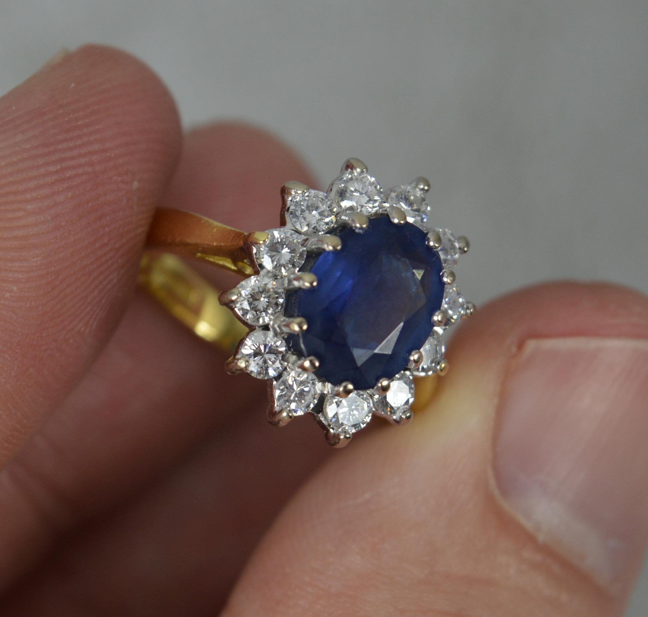 Oval Cut Lady Diana Blue Sapphire and 0.7ct Diamond 18ct Gold Cluster Ring