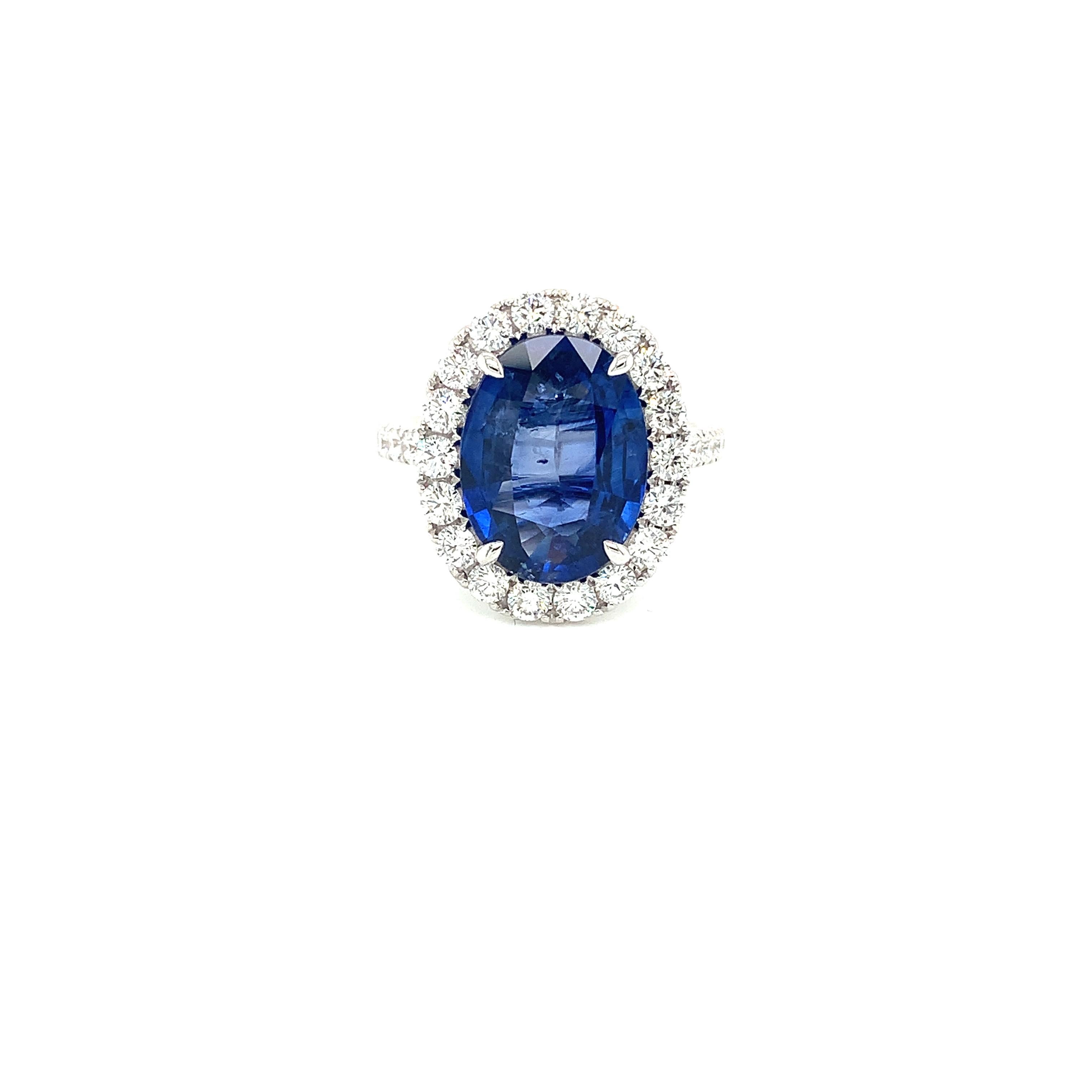 Oval Ceylon Sapphire weighing 5.44 carats
Measuring (13.31x10.05x4.74) mm
Diamonds weighing 1.15 carats
Set in 18k white gold ring