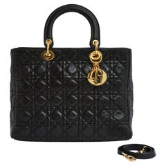Lady Dior 32 in pelle morbida nera con cinturino