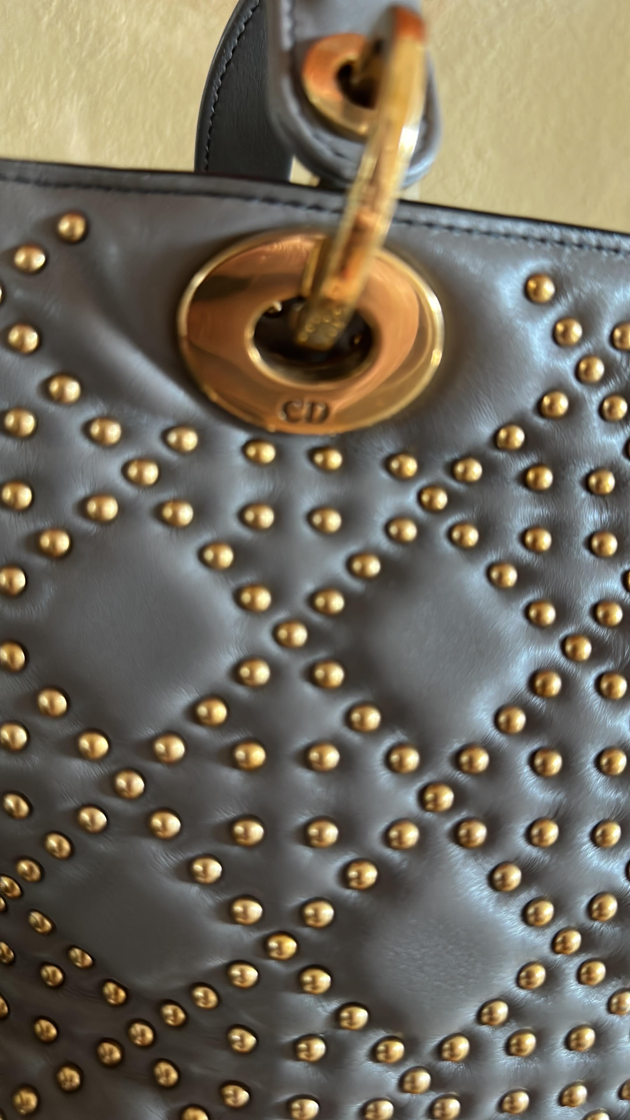 Lady Dior bag with removable shoulder strap
Lambskin with stud embroidery
Medium size 24x20x11
Good Condition , year 2017
Complete with dustbag 


Iconic bag of the Maison, the Lady Dior embodies all the codes of Dior leather goods: washed lambskin