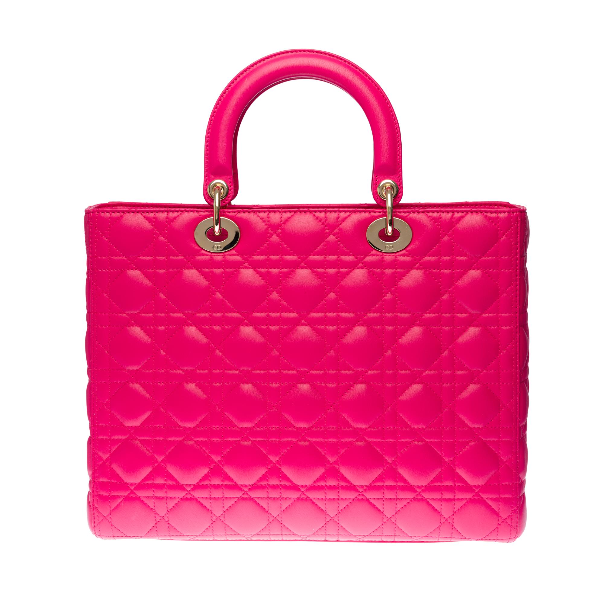 Very chic shoulder bag Christian Dior, Lady Dior large model (GM) in Fuchsia pink leather cannage , silver metal hardware, double handle in pink leather, removable shoulder strap handle in pink leather allowing a hand or shoulder support or shoulder
