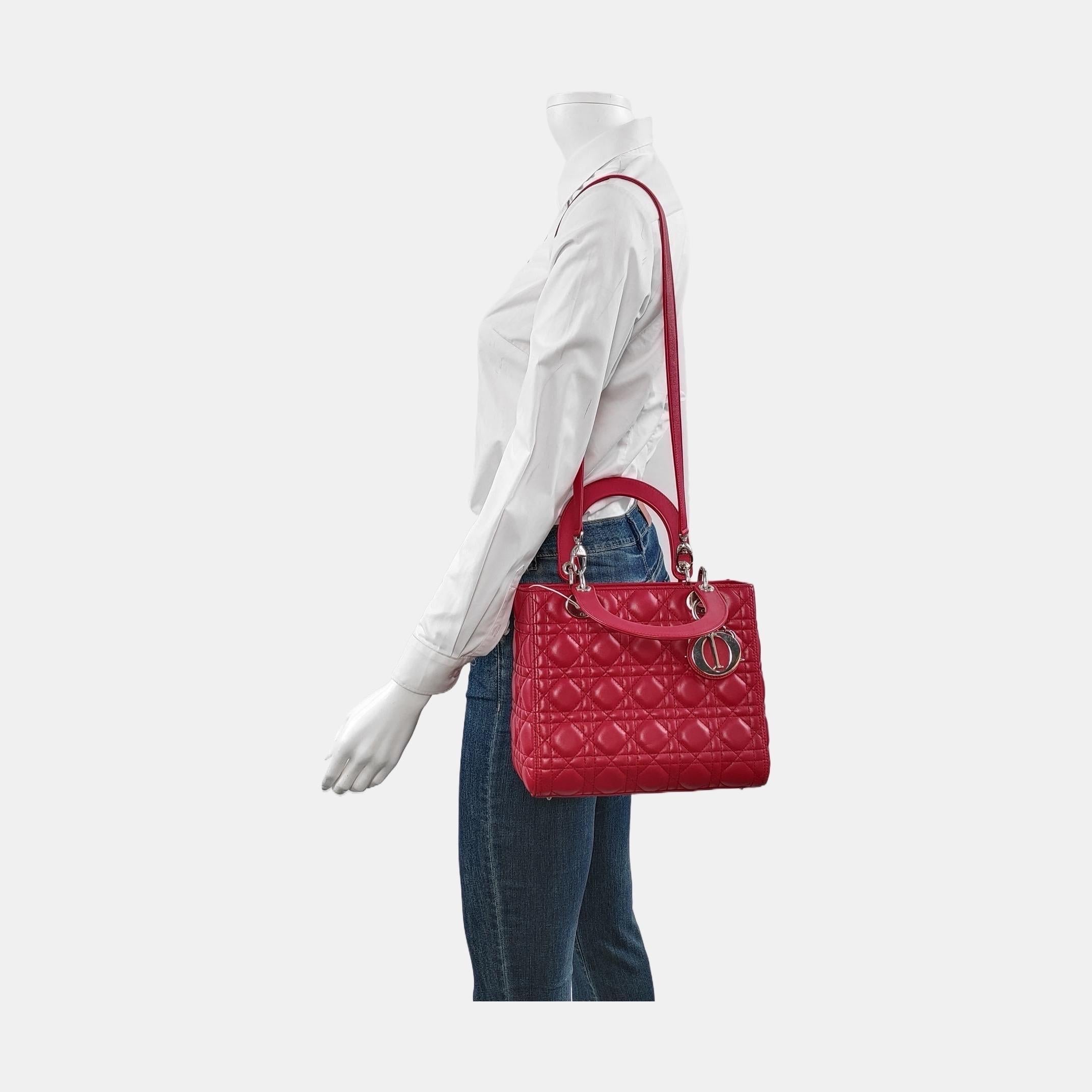 The Lady Dior bag is an epitome of elegance and beauty. Accentuate your look with the timeless style of Medium Lady Dior, crafted in Lambskin Leather. This classic bag features a cannage stitch, creating a beautiful silhouette and an instantly