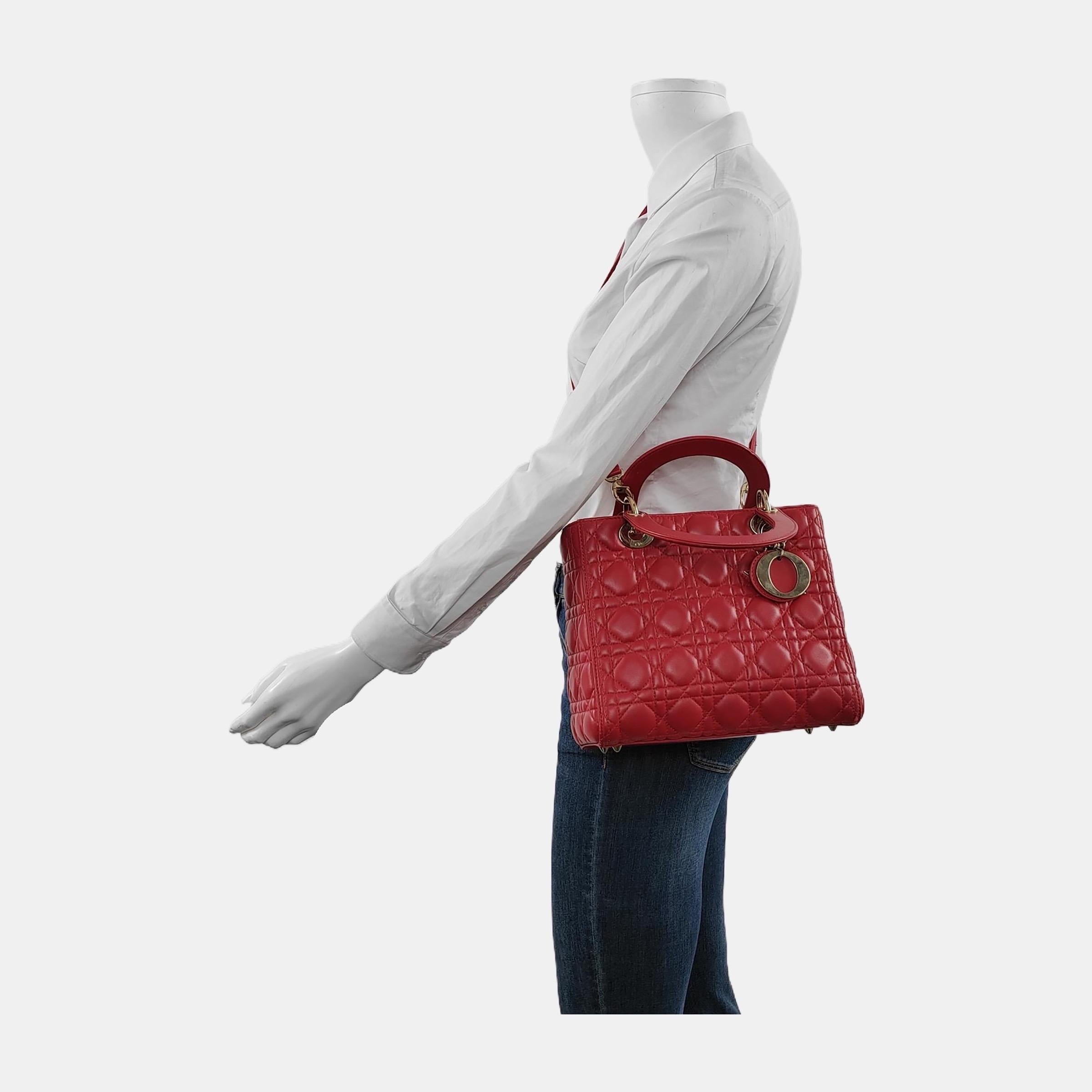 The Lady Dior bag is an epitome of elegance and beauty. Accentuate your look with the timeless style of Medium Lady Dior, crafted in Lambskin Leather. This classic bag features a cannage stitch, creating a beautiful silhouette and an instantly