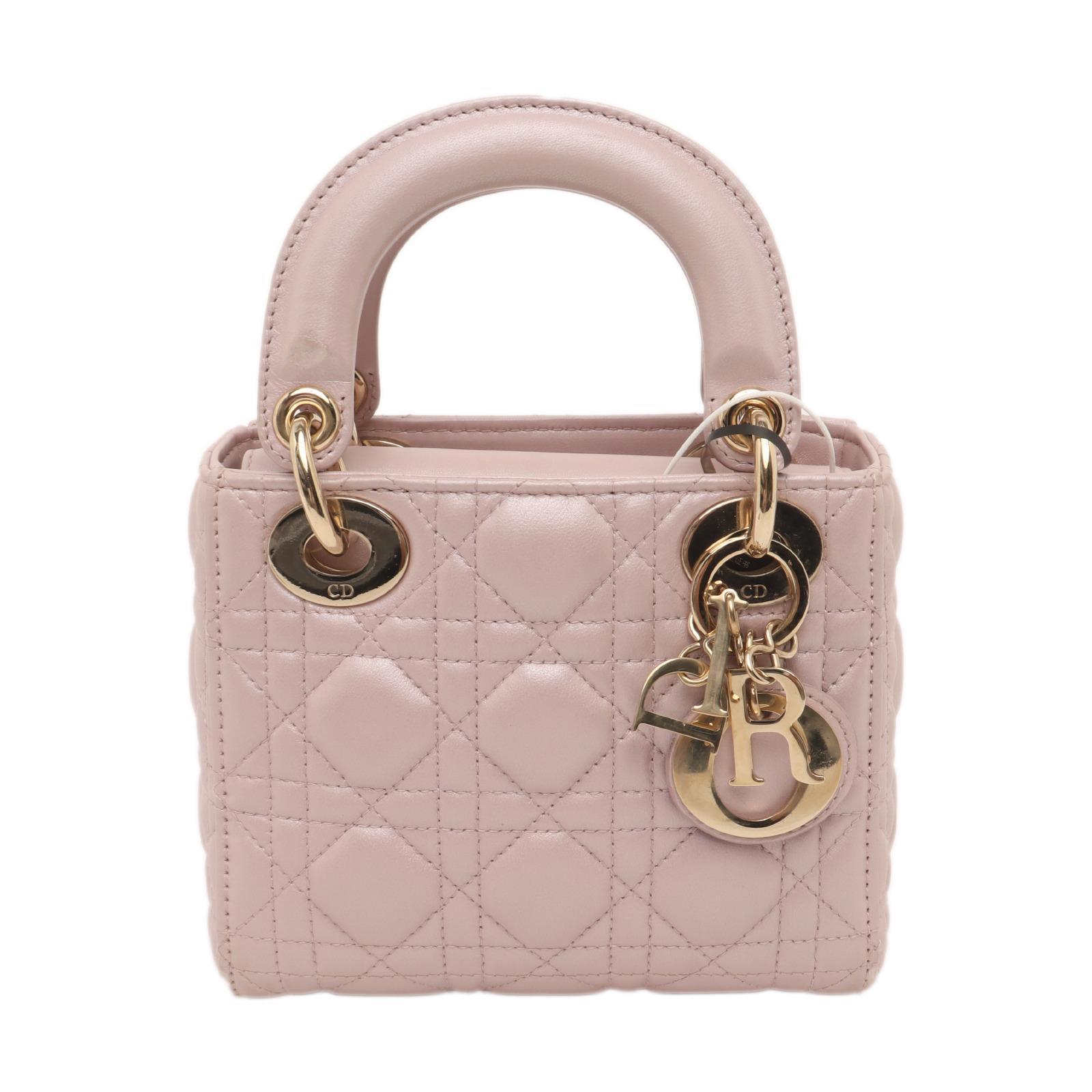 Lady Dior Mini 2020 Pearlescent Pink Lambskin Leather Gold HW Chain Strap
 These are professional photos of the actual bag offered
 CONDITION: VERY GOOD
 This preloved handbag is in very good condition with light signs of wear. There may be some
