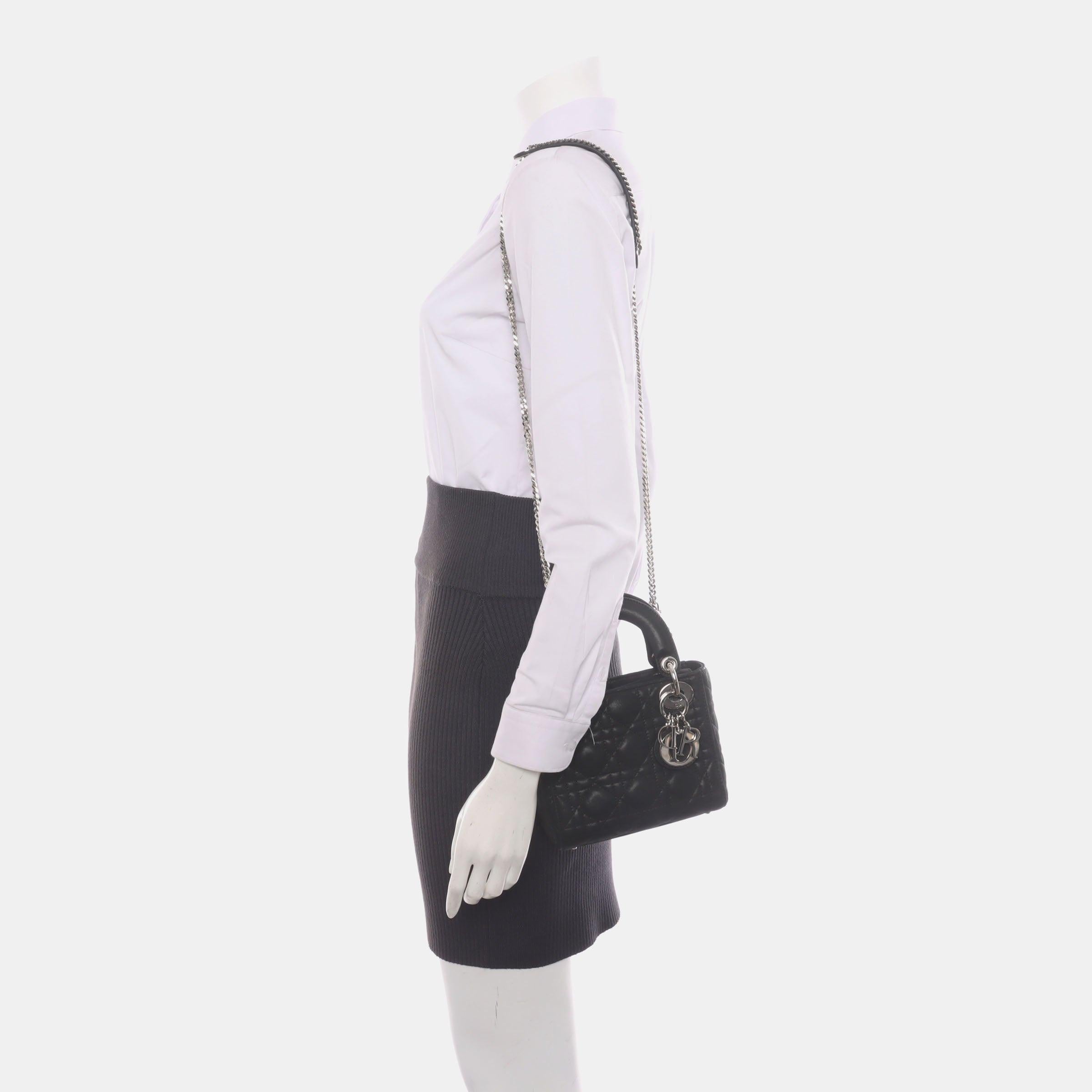 Lady Dior Mini Black Nubuck Aged Lambskin Leather handbag with silver hardware Chain Strap
These are professional photos of the actual bag.
This Lady Dior Mini handbag features aged calfskin leather with a perforated texture decorated with silver