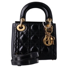 Lady Dior Mini Black Patent Leather handbag with gold hardware Leather Strap