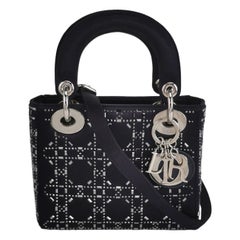 Lady Dior Mini in seta nera con cristalli e hardware in argento