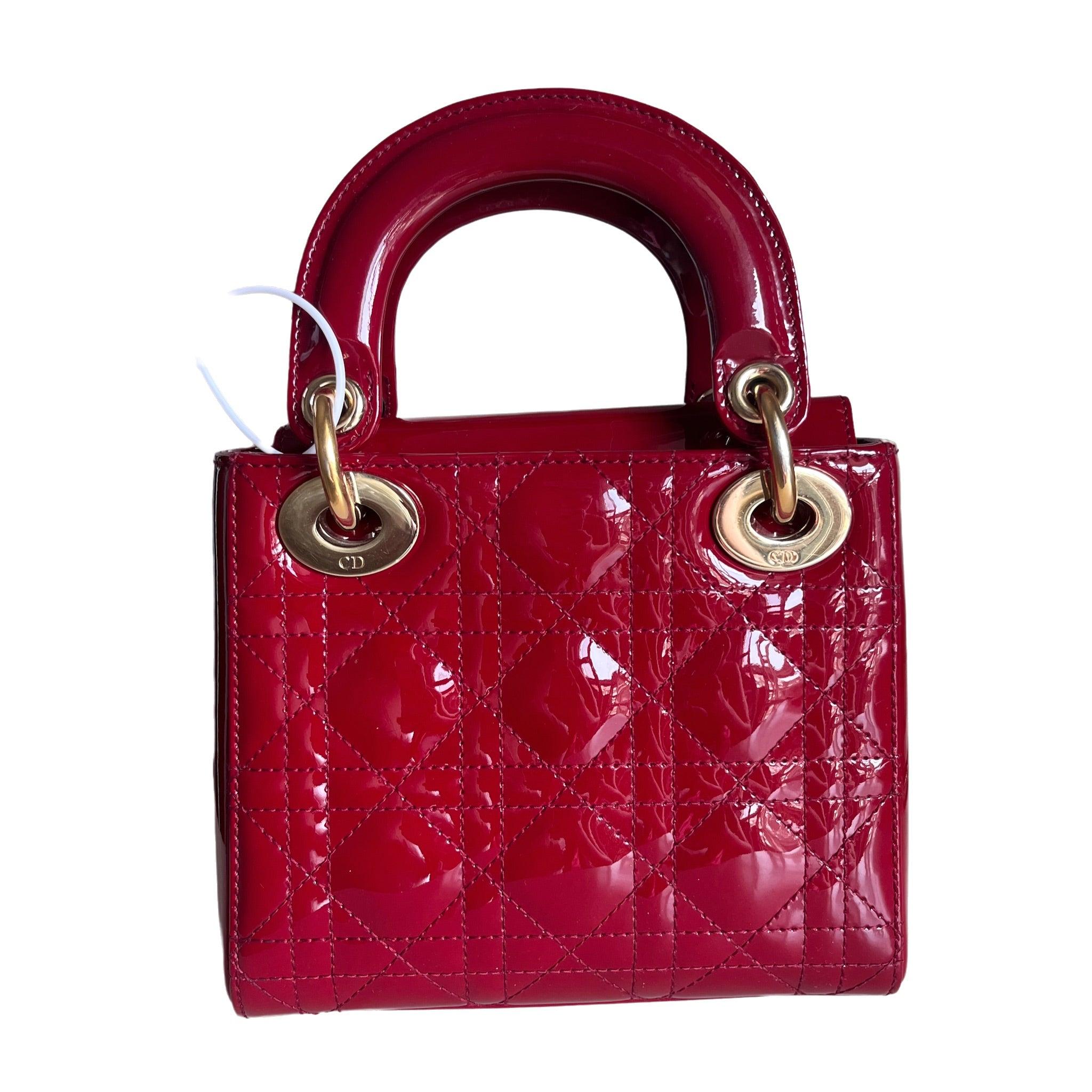 Lady Dior Mini Handbag Burgundy Red Patent Leather Gold-tone Chain Strap
These are professional photos of the actual bag.
  This Lady Dior Mini handbag features a stunning red color in patent leather decorated with gold hardware, gold embellished