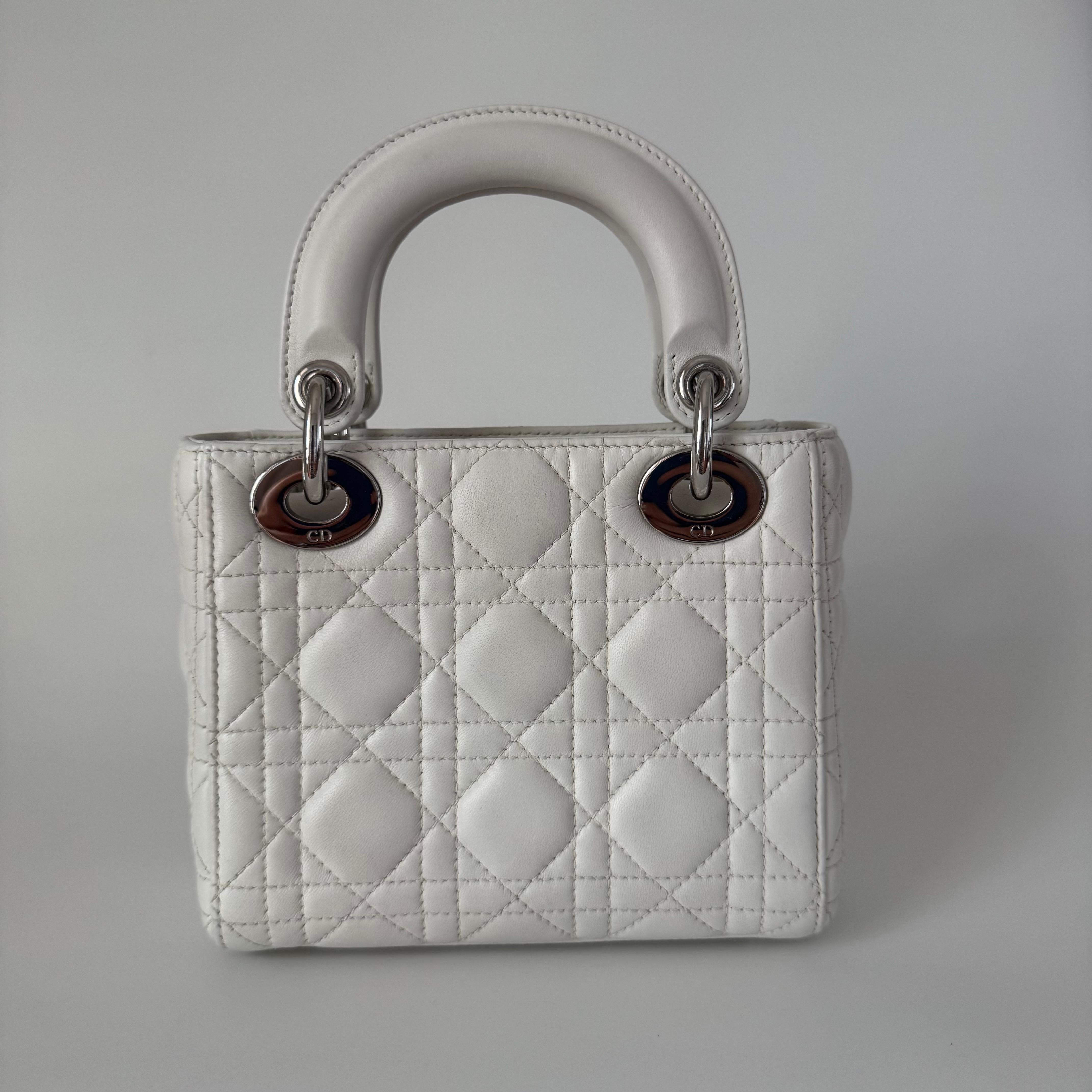 CONDITION: Excellent

This preloved handbag is in very good condition with light signs of wear. There may be some scratches to the hardware. The color of the corners and handles were professionally touched up. 

DETAILS

Brand: Christian Dior
Model: