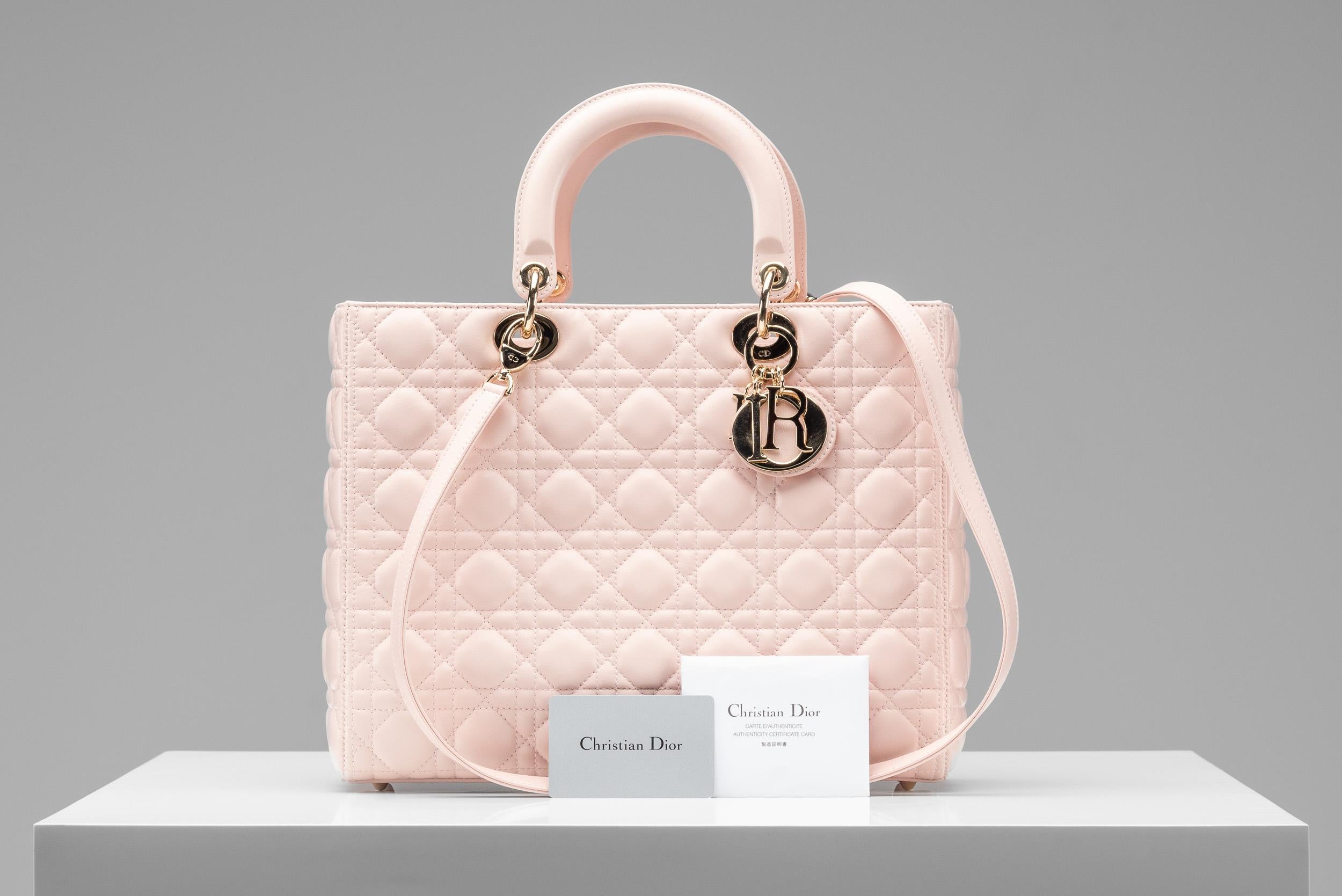 From the collection of SAVINETI we offer this Lady Dior Bag:
- Brand: Dior
- Model: Lady Dior Large 
- Color: Light Pink 
- Year: 2013
- Condition: Excellent
- Materials: lambskin leather, Gold-Tone hardware
- Extras: authenticity card

Authenticity