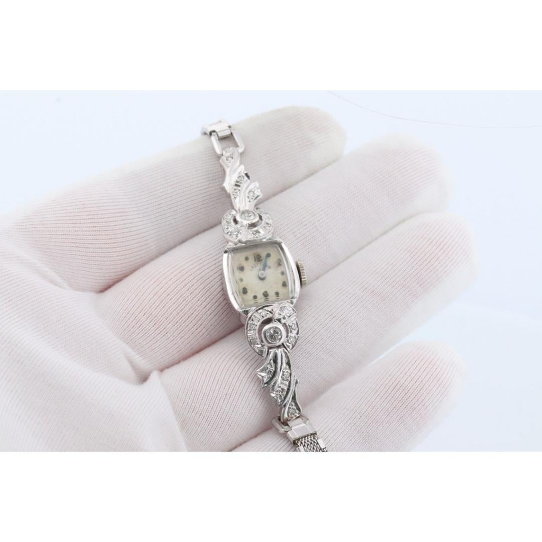 Lady Elgin Uhr. Lord Elgin Handgefertigte Damenarmbanduhr aus Platin und Diamanten. 4