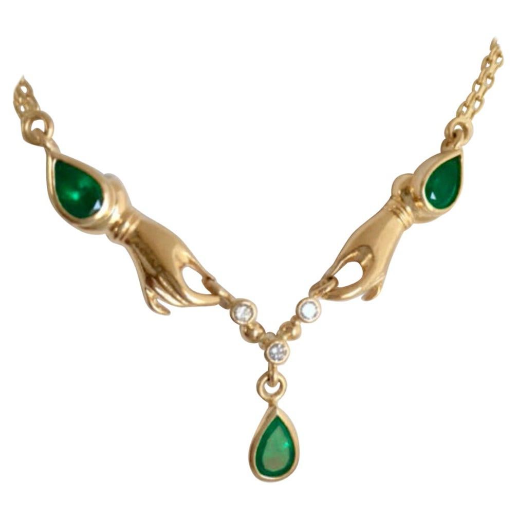 Lady Hands Emerald and Diamond Necklace 18 Karat Gold For Sale