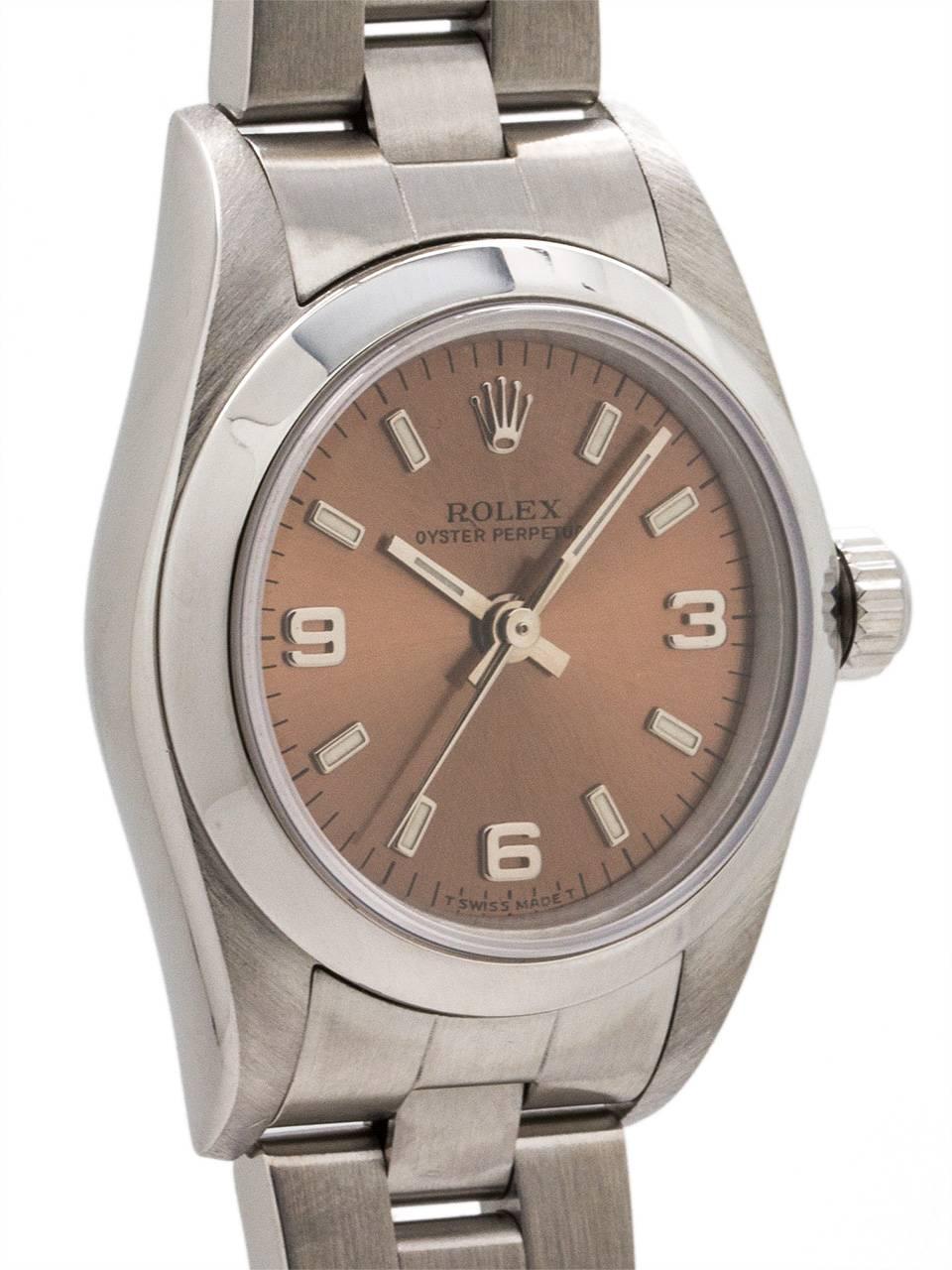 Lady Rolex Stainless Steel Oyster Perpetualref 76080 serial# A9 circa 1998. Featuring a 27mm diameter Oyster case with smooth bezel and sapphire crystal. Original salmon dial with applied silver figures and popular 3/6/9 Explorer style configuration