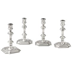 Lady Silversmiths, a Set of Four George I/II Candlesticks, London, 1722 & 1732